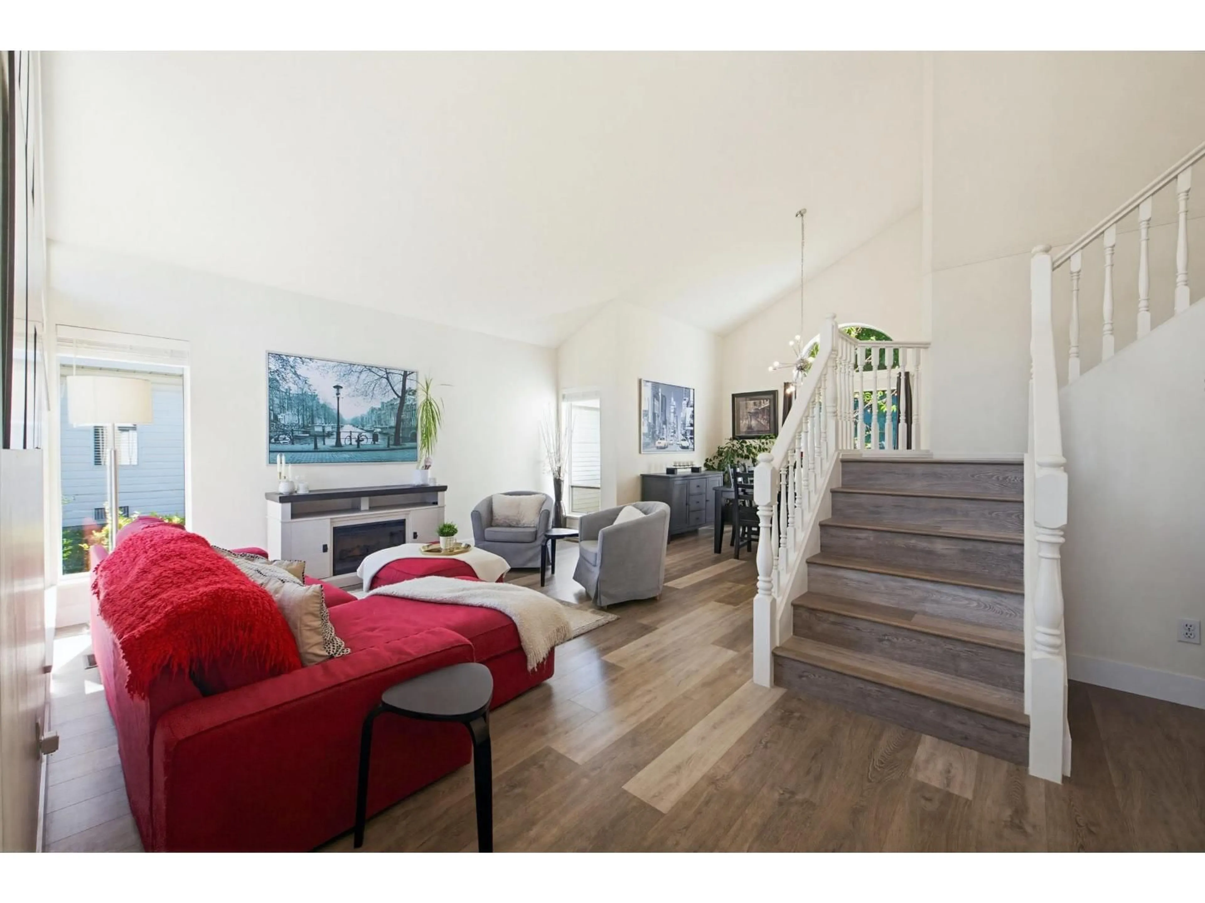 Living room with furniture, wood/laminate floor for 32328 SLOCAN DRIVE, Abbotsford British Columbia V2T5C9