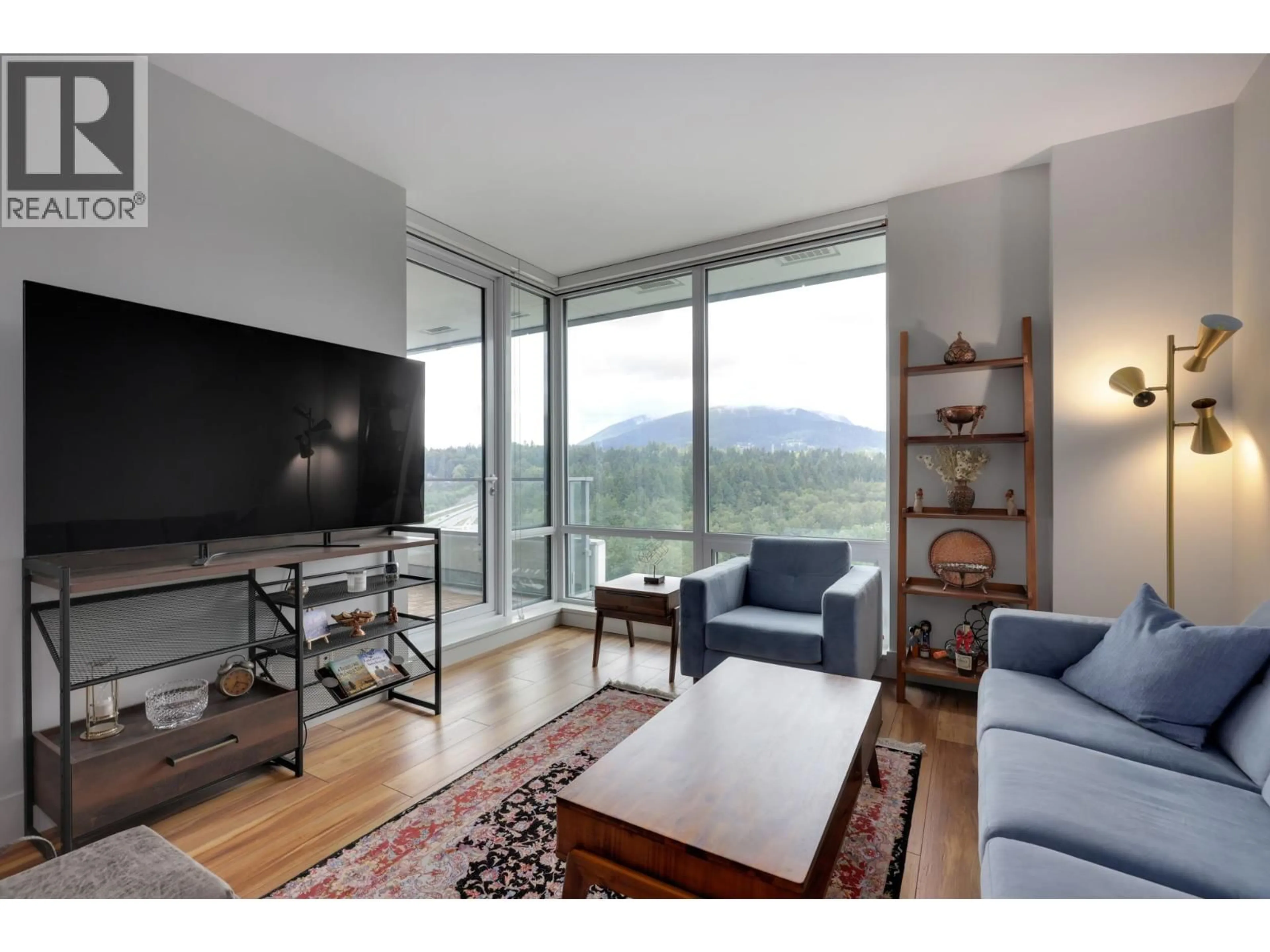 Living room with furniture, wood/laminate floor for 2601 - 680 SEYLYNN CRESCENT, North Vancouver British Columbia V7J0B5