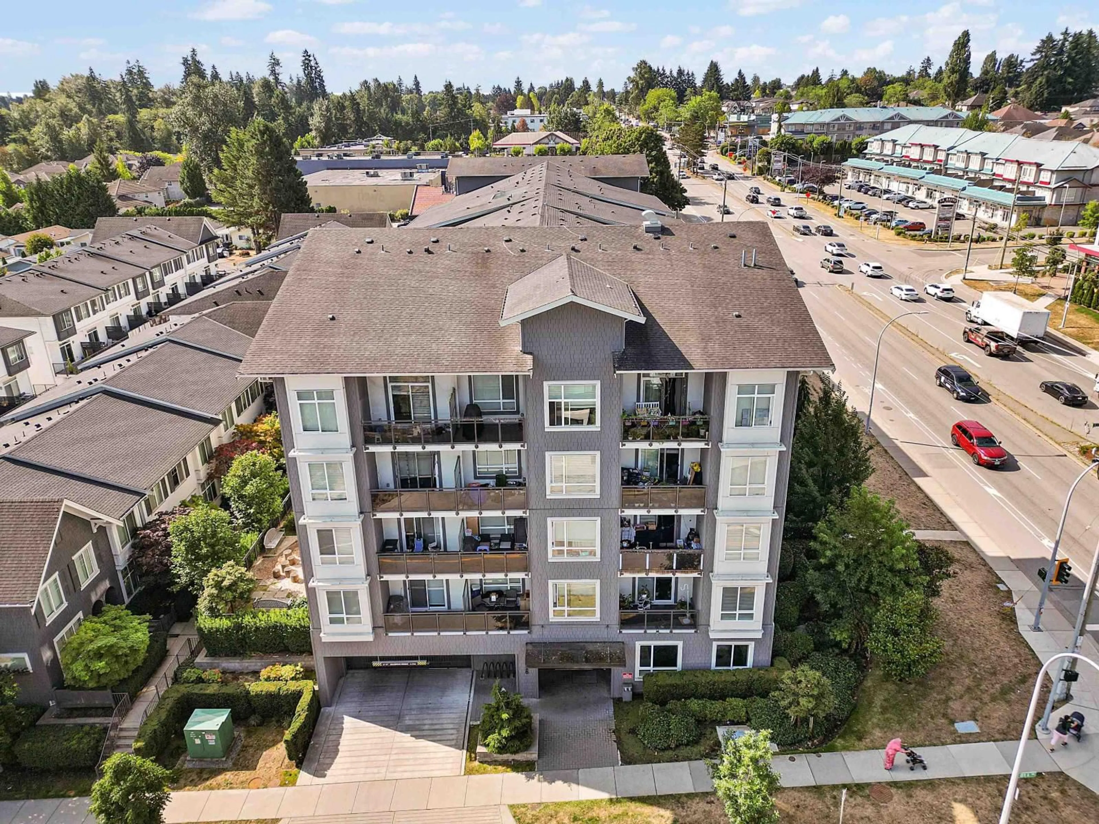 A pic from outside/outdoor area/front of a property/back of a property/a pic from drone, unknown for 106 - 13628 81A AVENUE, Surrey British Columbia V3W3E2