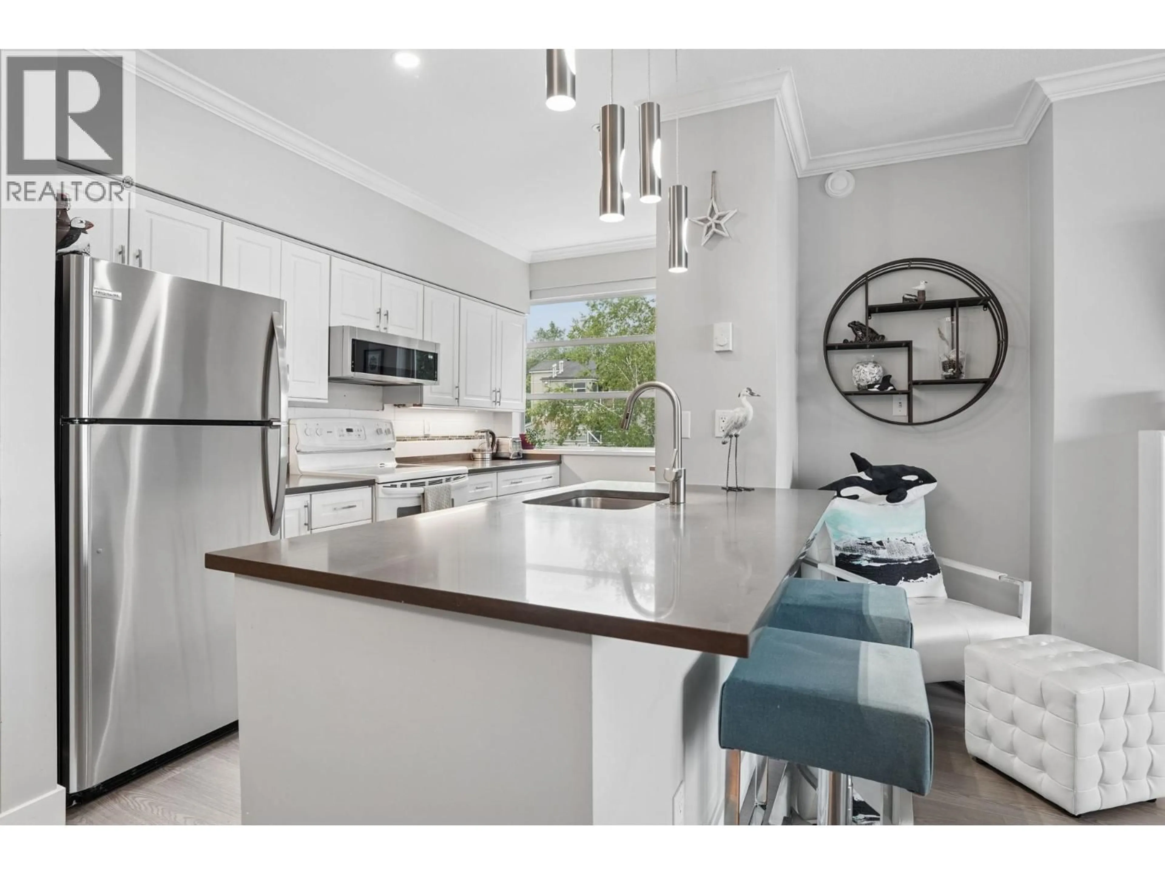 Open concept kitchen, ceramic/tile floor for 311 - 2020 KENT AVENUE SOUTH, Vancouver British Columbia V5P4X1