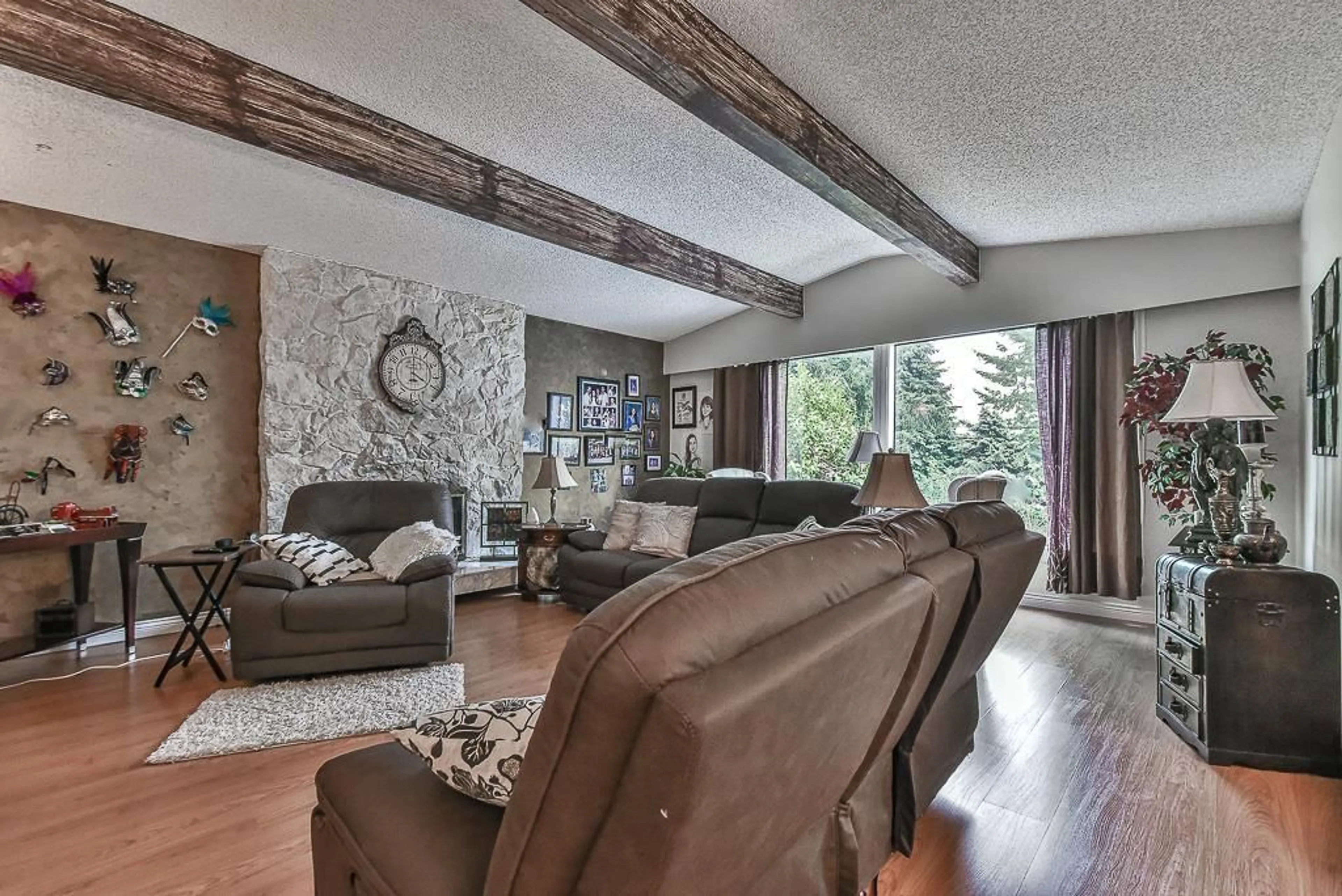 Living room with furniture, wood/laminate floor for 13243 COULTHARD ROAD, Surrey British Columbia V3X3E5