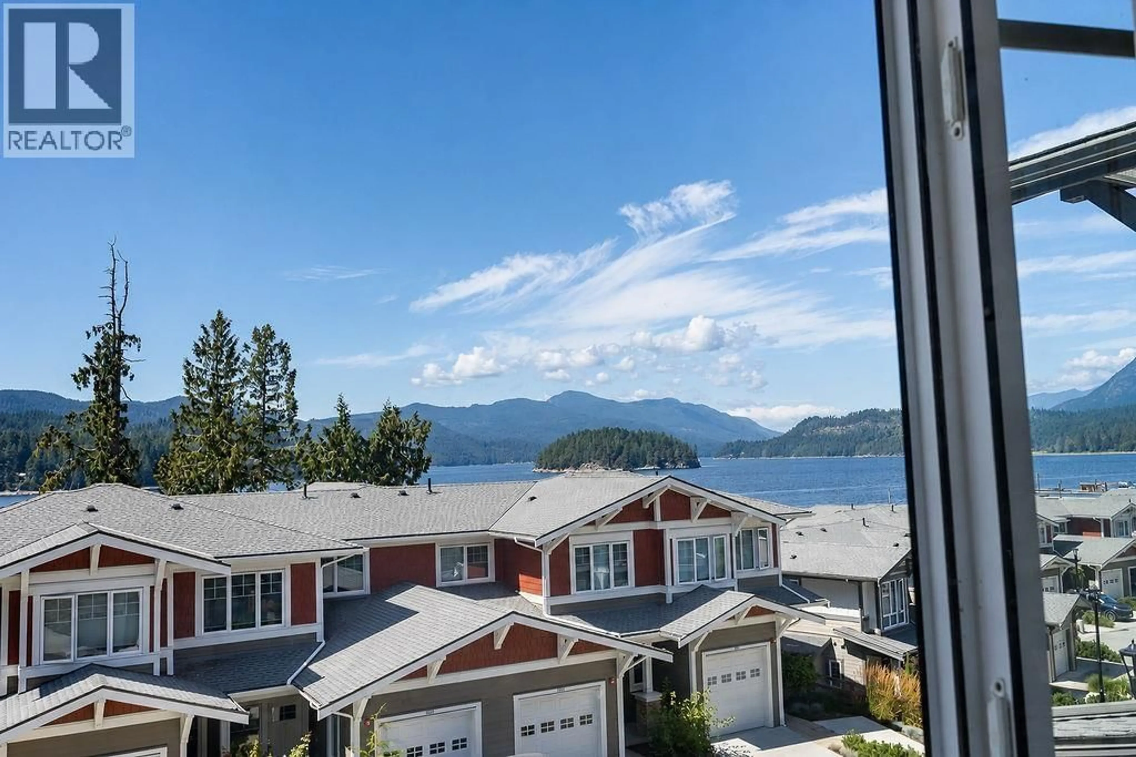 A pic from outside/outdoor area/front of a property/back of a property/a pic from drone, water/lake/river/ocean view for 5902 BEACHGATE LANE, Sechelt British Columbia V7Z0S3