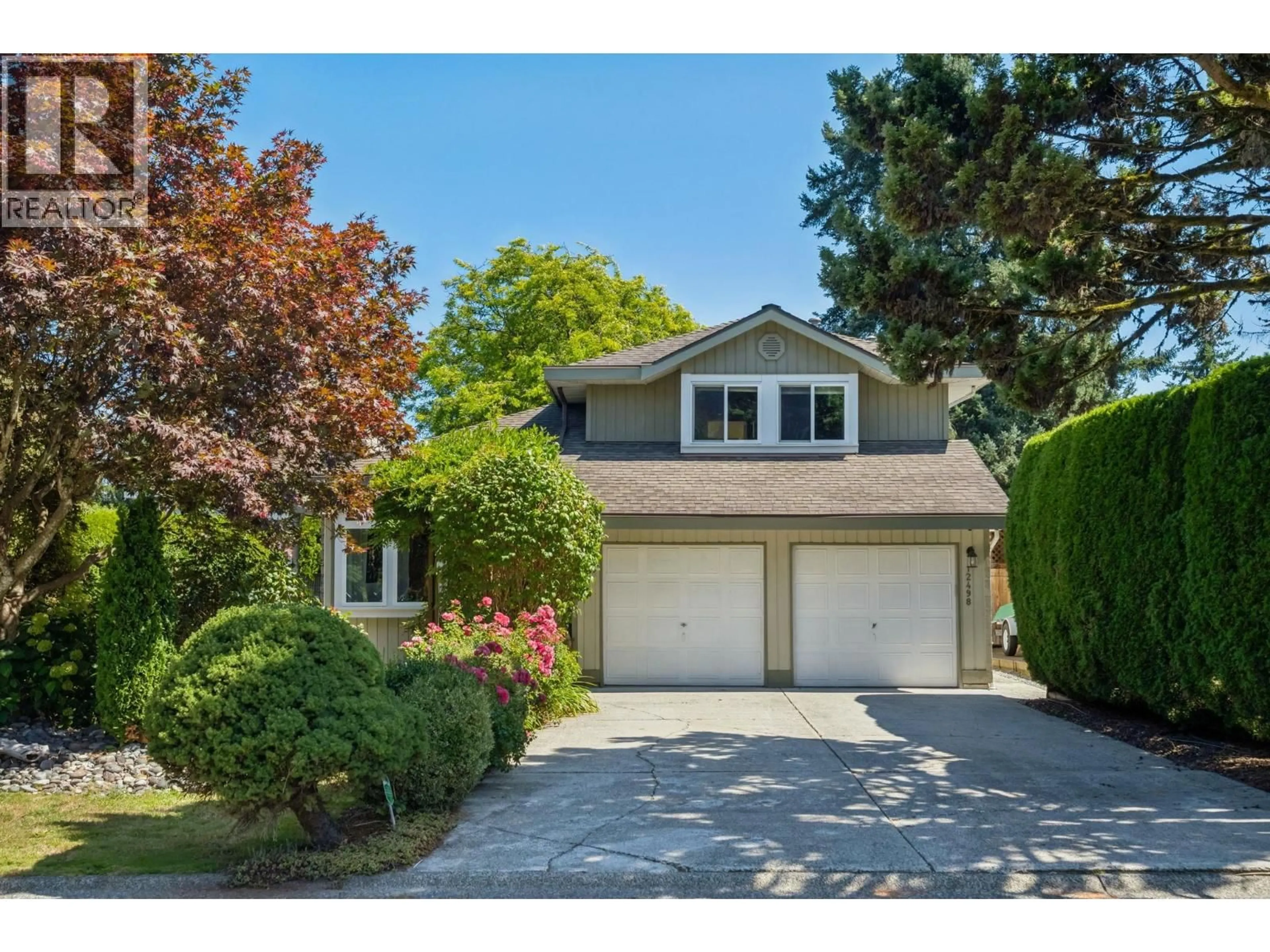 Home with vinyl exterior material, street for 12498 202B STREET, Maple Ridge British Columbia V2X9X3
