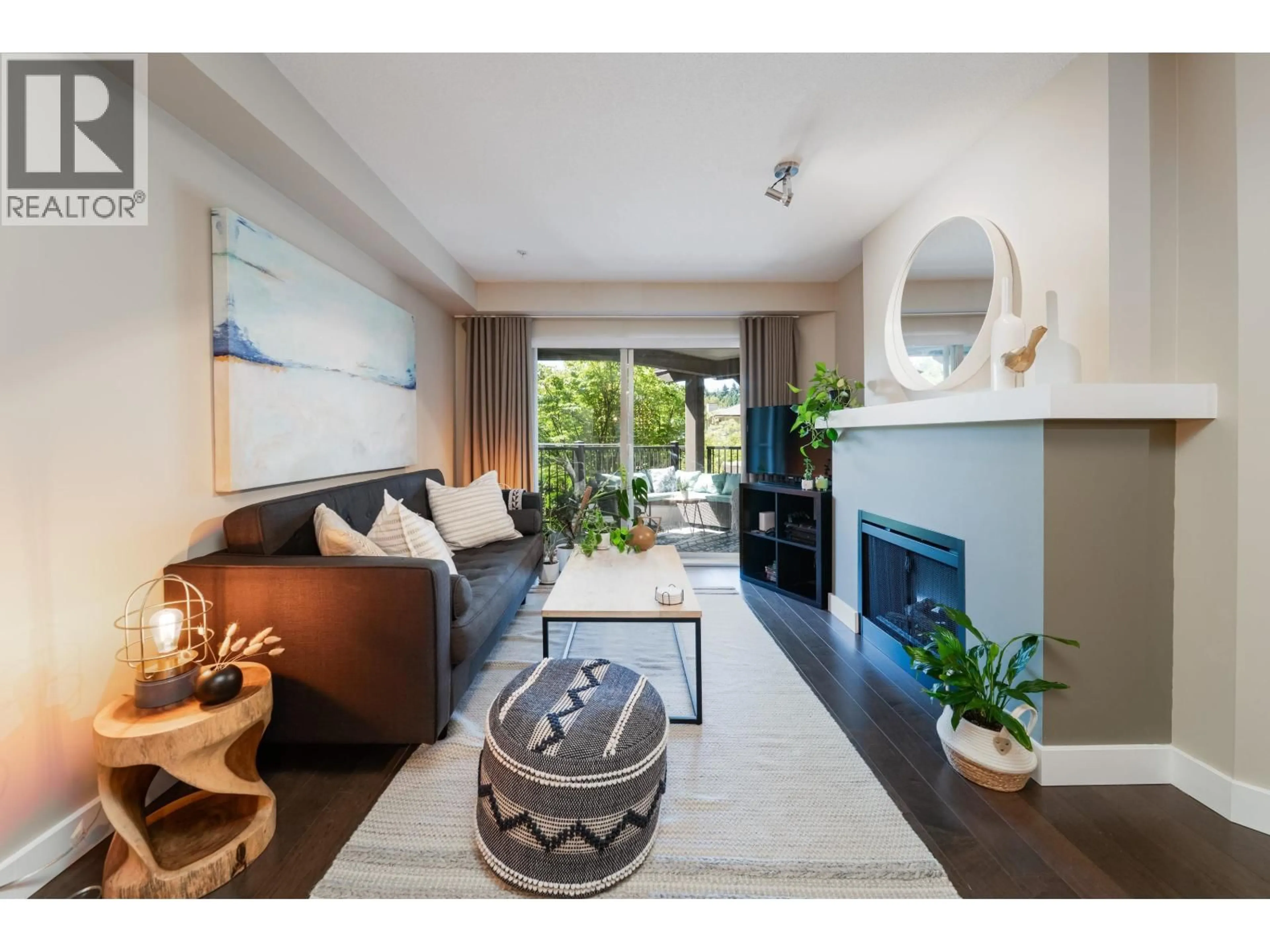 Living room with furniture, unknown for 211 - 400 KLAHANIE DRIVE, Port Moody British Columbia V3H5K9