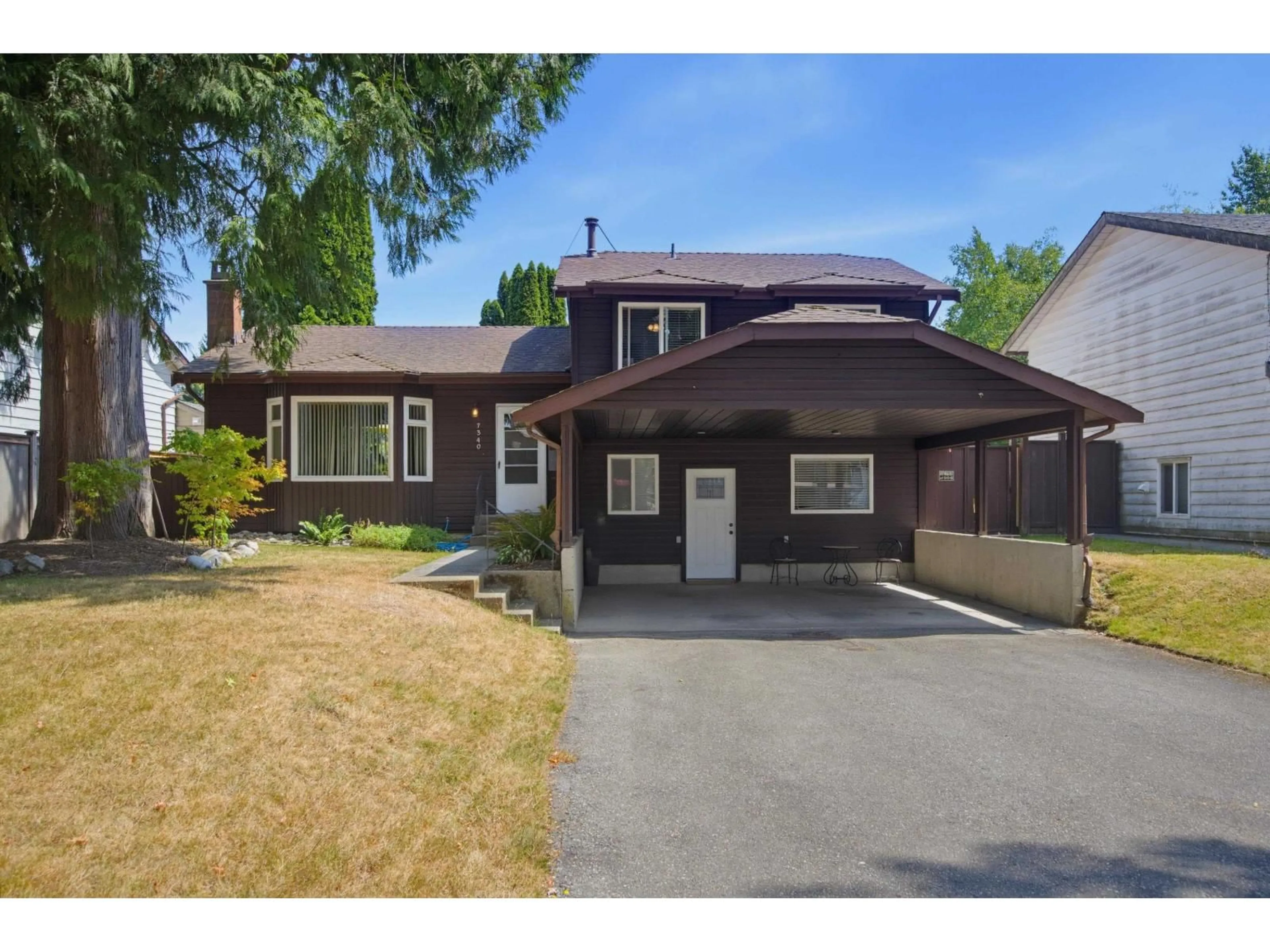 Home with vinyl exterior material, street for 7340 TODD CRESCENT, Surrey British Columbia V3W7N6