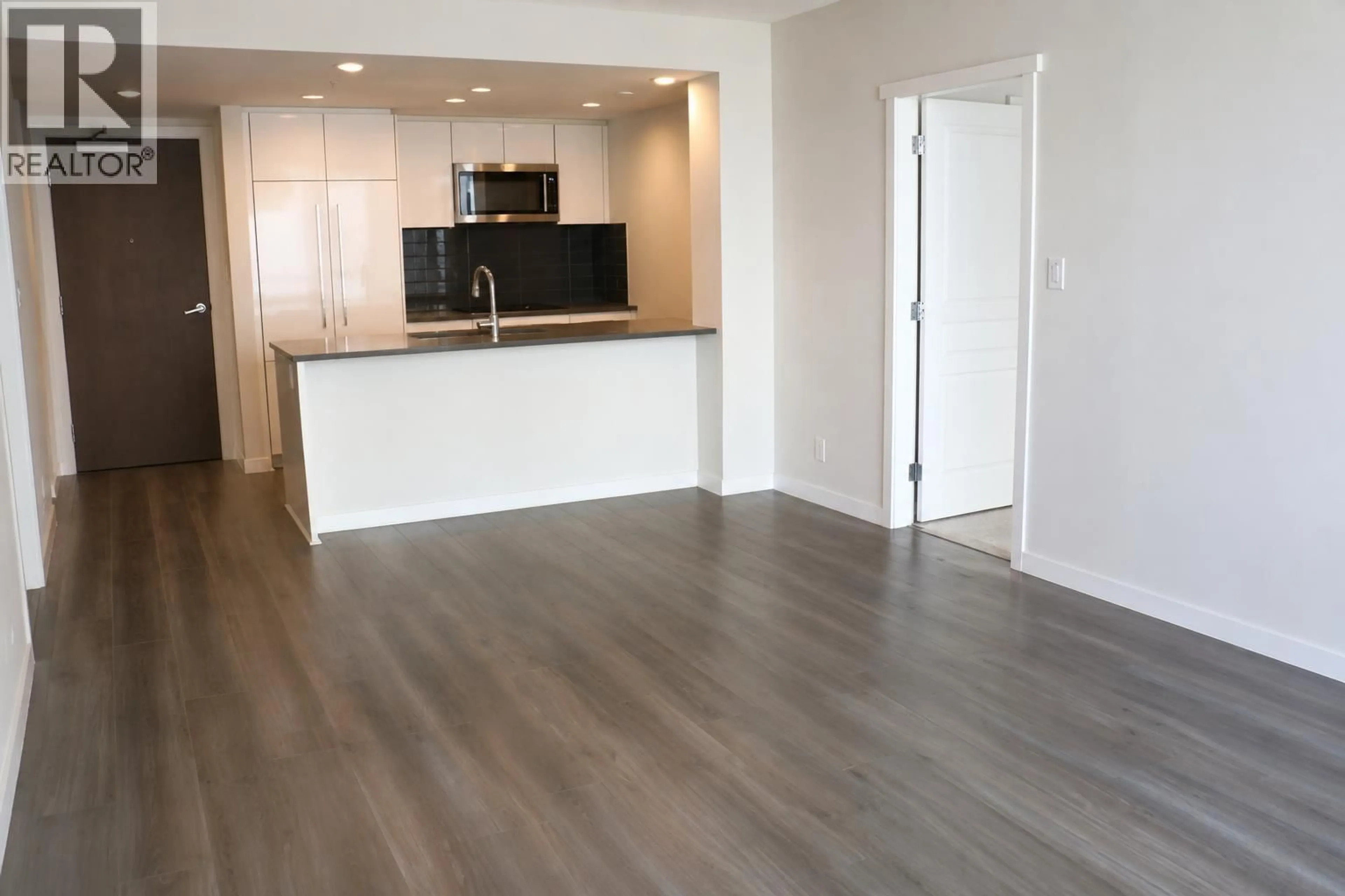 Open concept kitchen, wood/laminate floor for 1902 - 3096 WINDSOR GATE, Coquitlam British Columbia V3B0P4