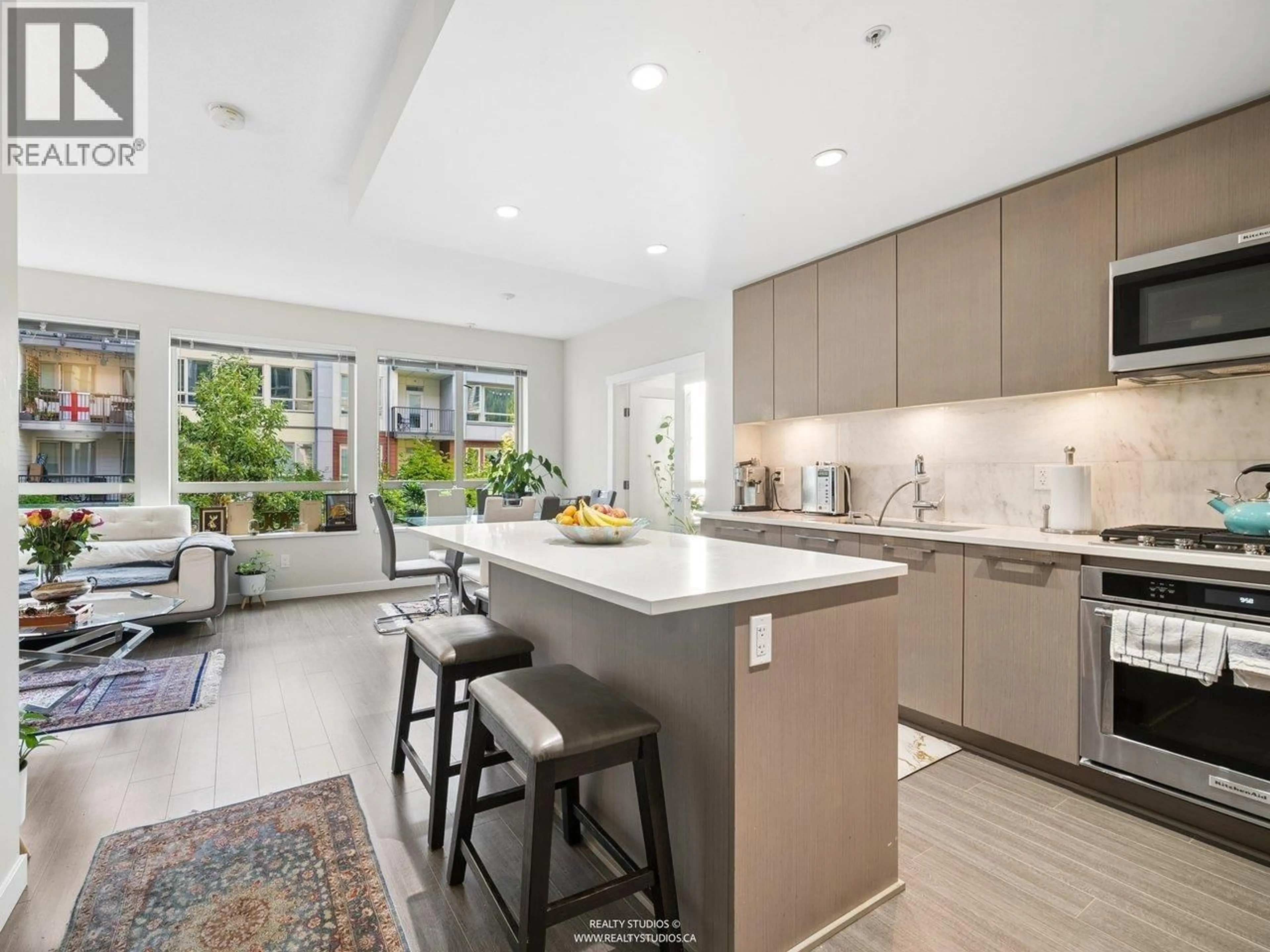Open concept kitchen, unknown for 213 - 2651 LIBRARY LANE, North Vancouver British Columbia V7J0C1