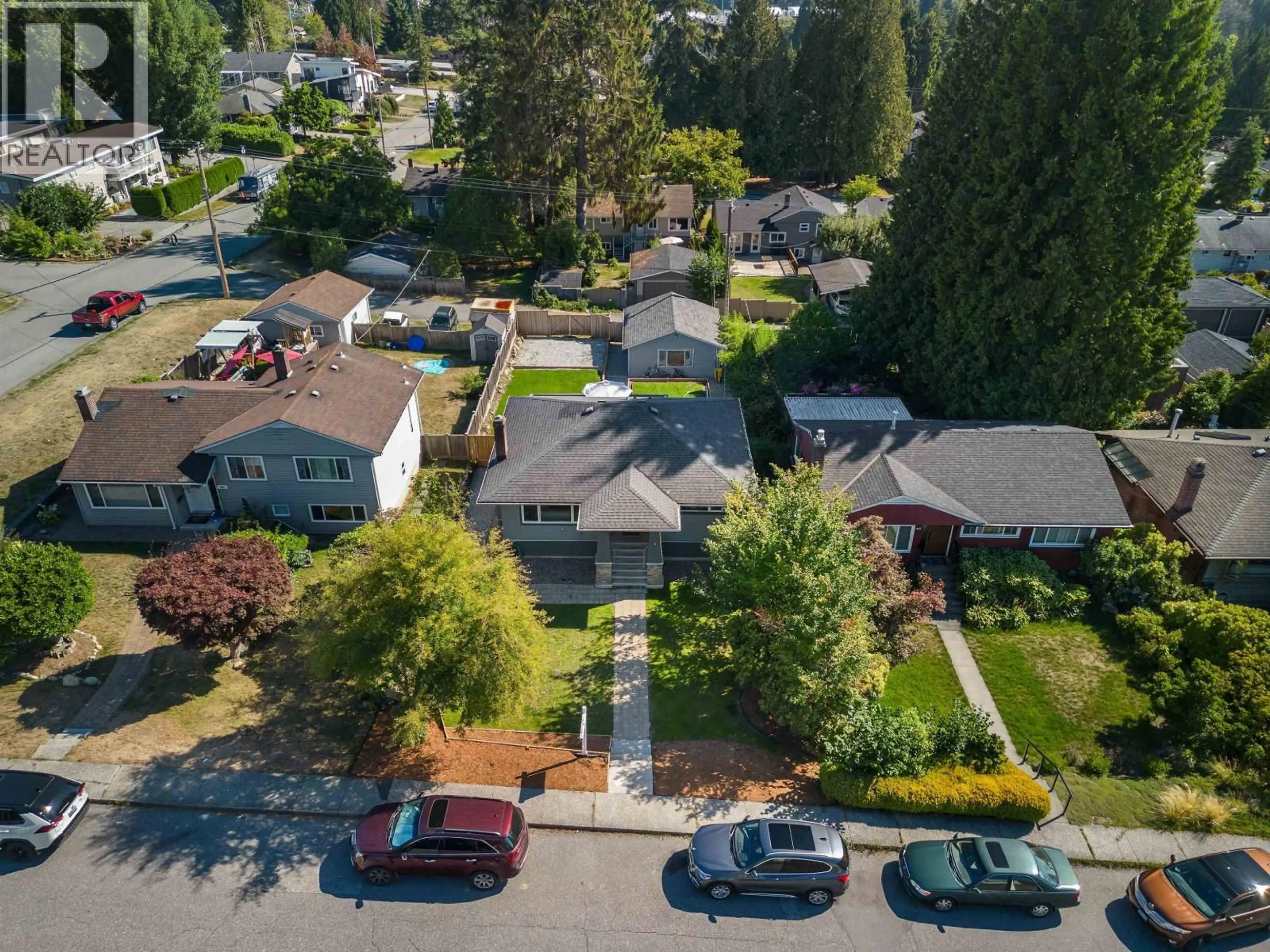 A pic from outside/outdoor area/front of a property/back of a property/a pic from drone, street for 409 27TH STREET, North Vancouver British Columbia V7N2H7