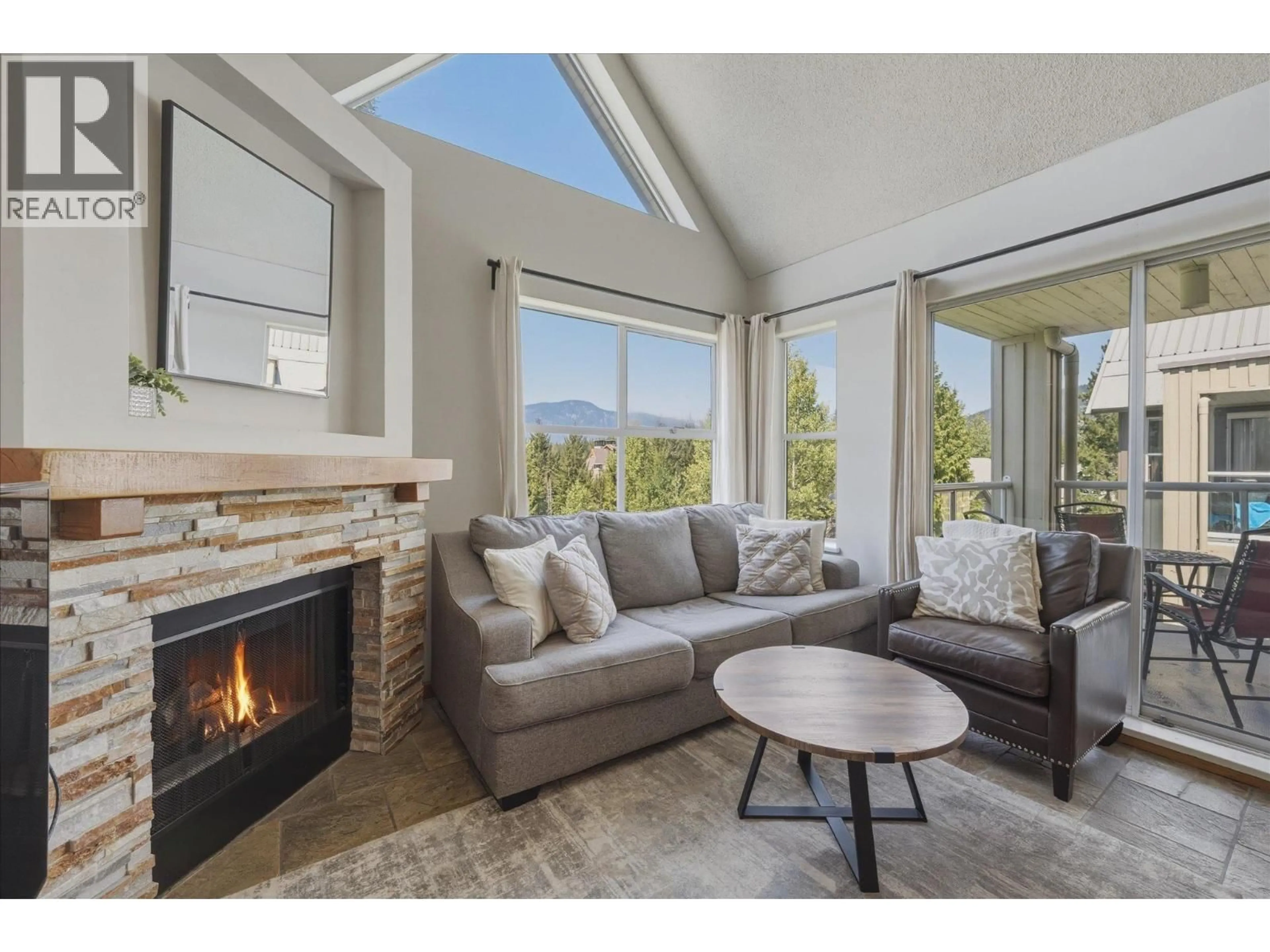 Living room with furniture, unknown for 302 - 4749 SPEARHEAD DRIVE, Whistler British Columbia V8E1E9