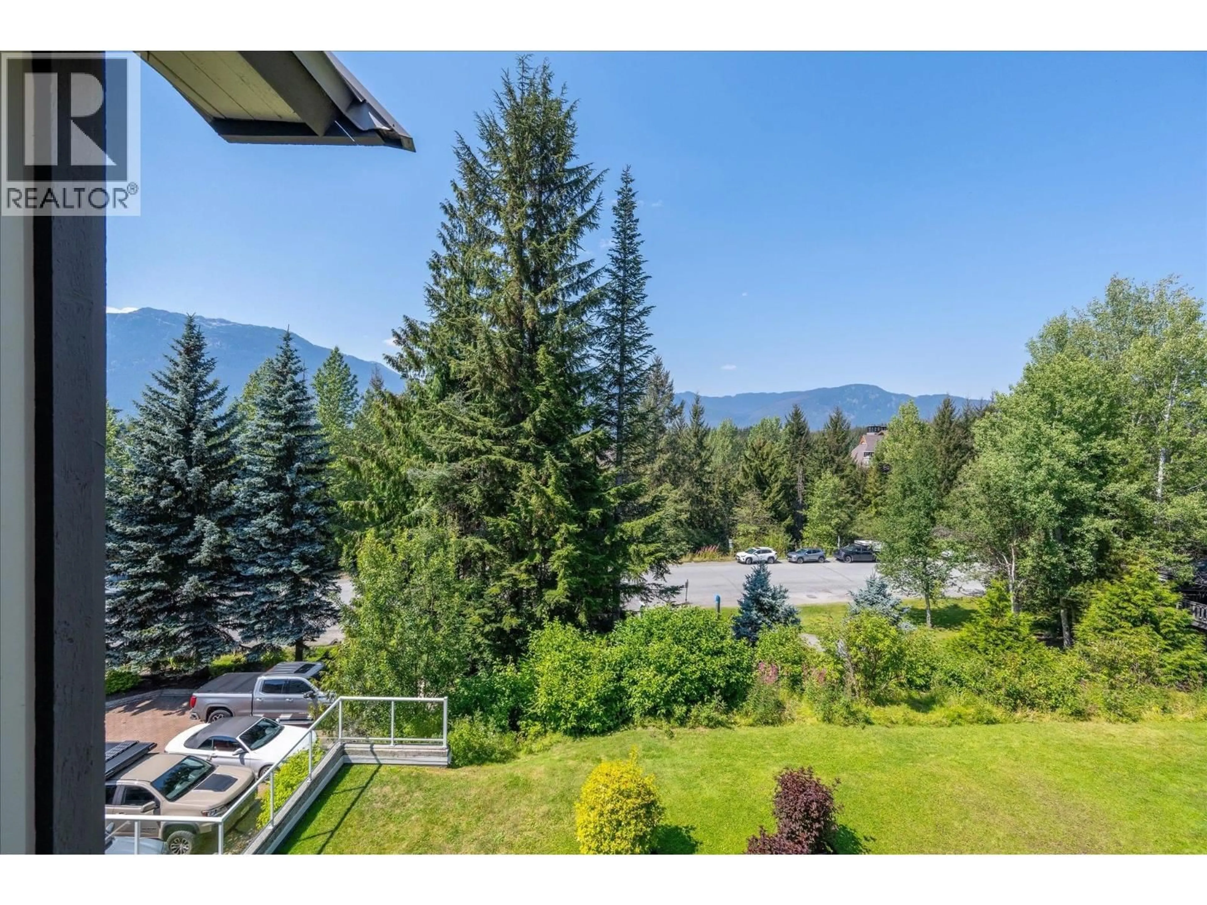 A pic from outside/outdoor area/front of a property/back of a property/a pic from drone, mountain view for 302 - 4749 SPEARHEAD DRIVE, Whistler British Columbia V8E1E9