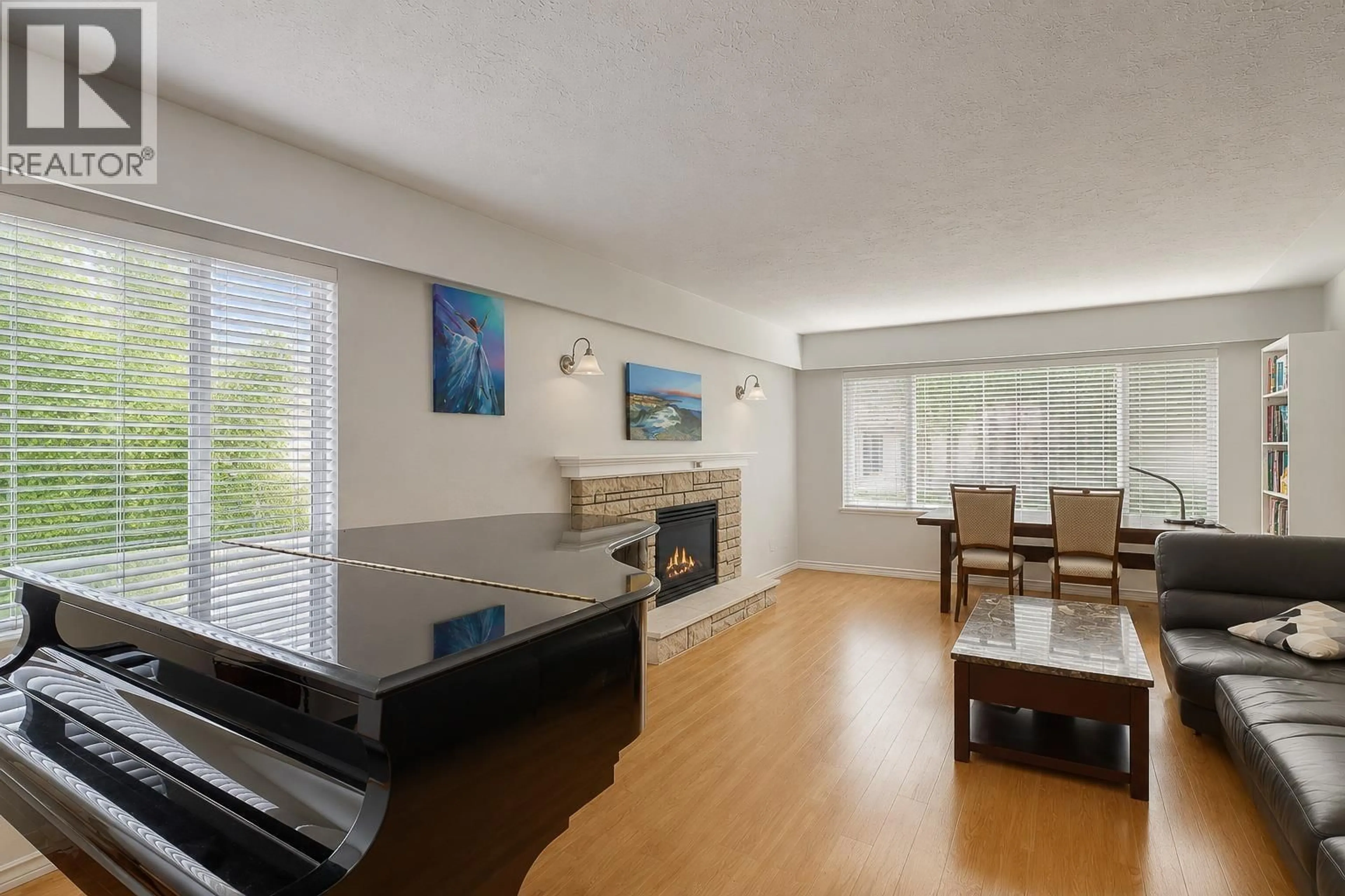 Living room with furniture, wood/laminate floor for 1743 49TH AVENUE, Vancouver British Columbia V5P1T1