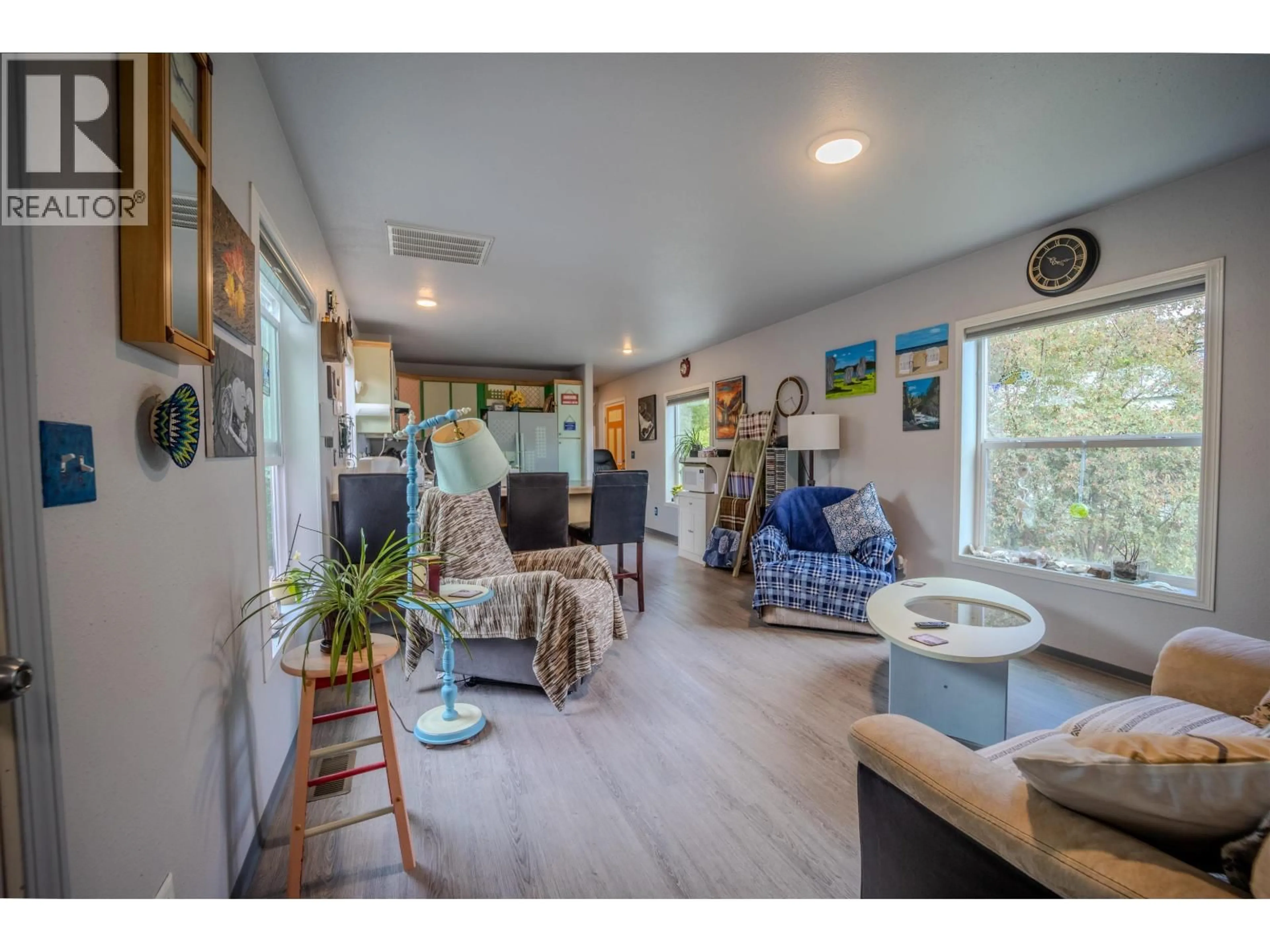 Living room with furniture, wood/laminate floor for 81 - 3889 MULLER STREET, Thornhill British Columbia V8G4L2