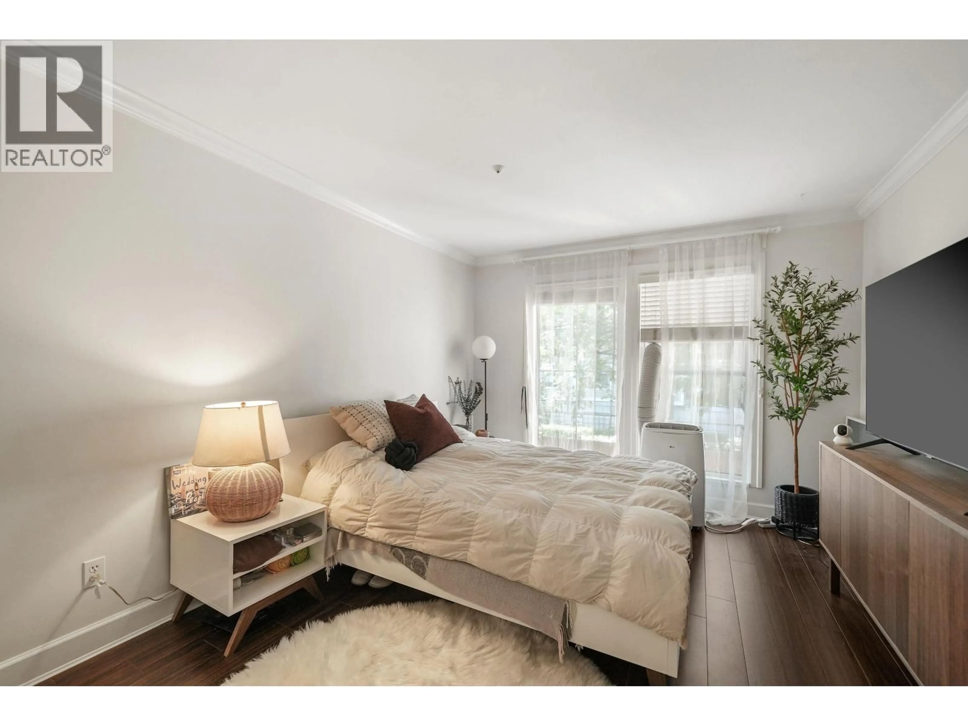 Bedroom with bed, wood/laminate floor for 302 - 888 GAUTHIER AVENUE, Coquitlam British Columbia V3K6Y1