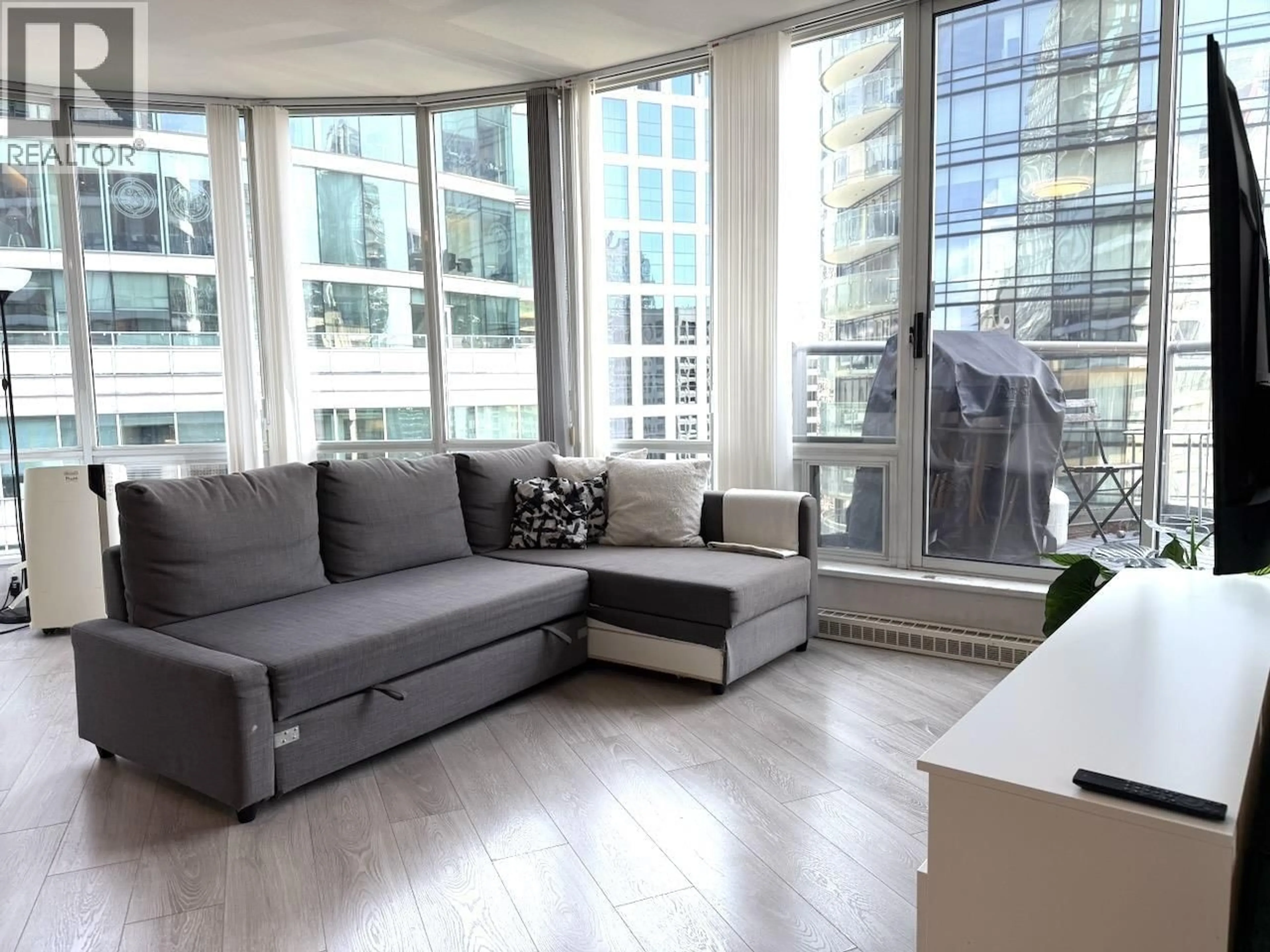 Living room with furniture, unknown for 2605 - 1166 MELVILLE STREET, Vancouver British Columbia V6E4P5