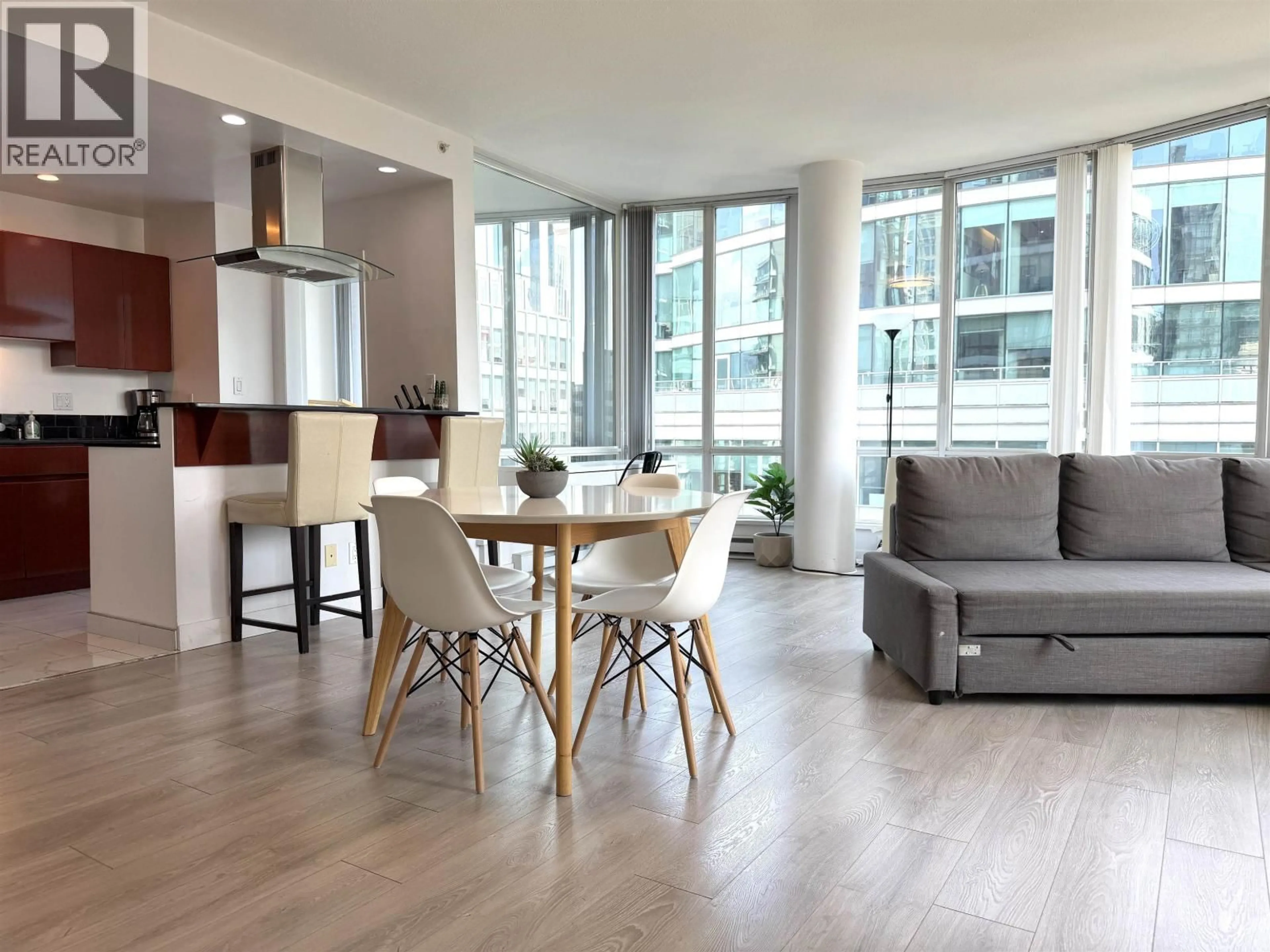 Living room with furniture, wood/laminate floor for 2605 - 1166 MELVILLE STREET, Vancouver British Columbia V6E4P5