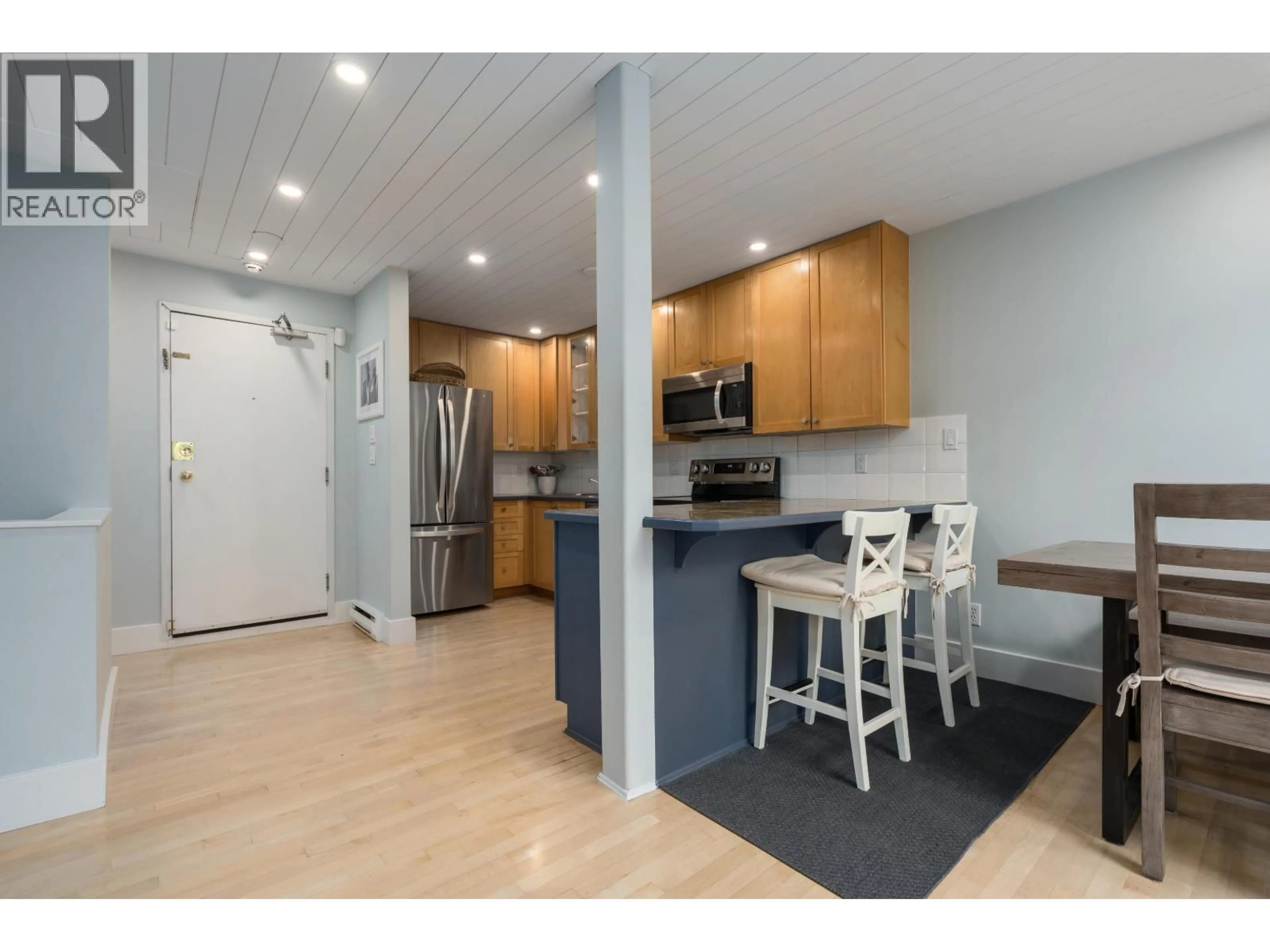 Open concept kitchen, unknown for 104 - 1477 FOUNTAIN WAY, Vancouver British Columbia V6H3W9