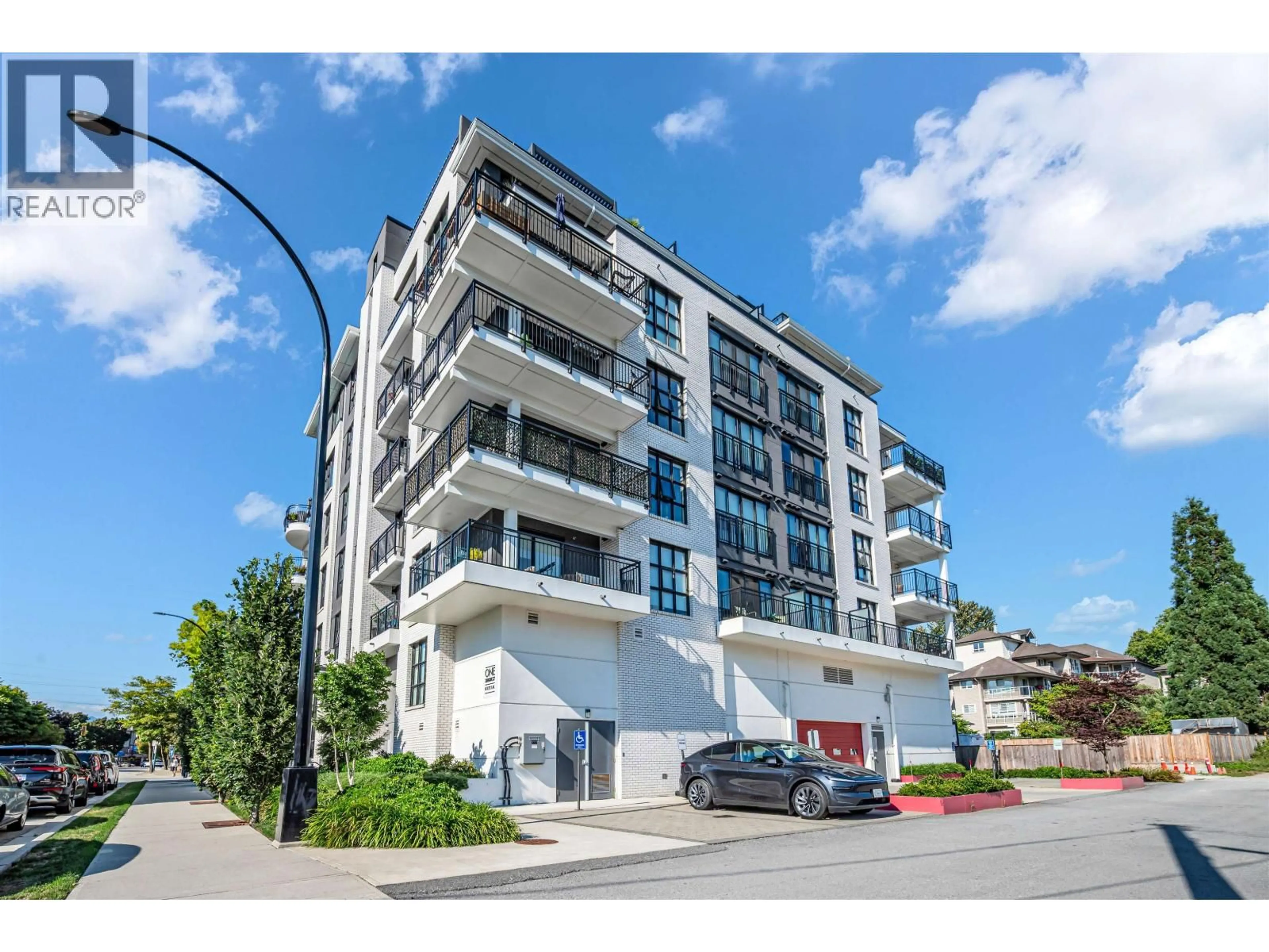 A pic from outside/outdoor area/front of a property/back of a property/a pic from drone, building for 406 - 2446 SHAUGHNESSY STREET, Port Coquitlam British Columbia V3C3E5
