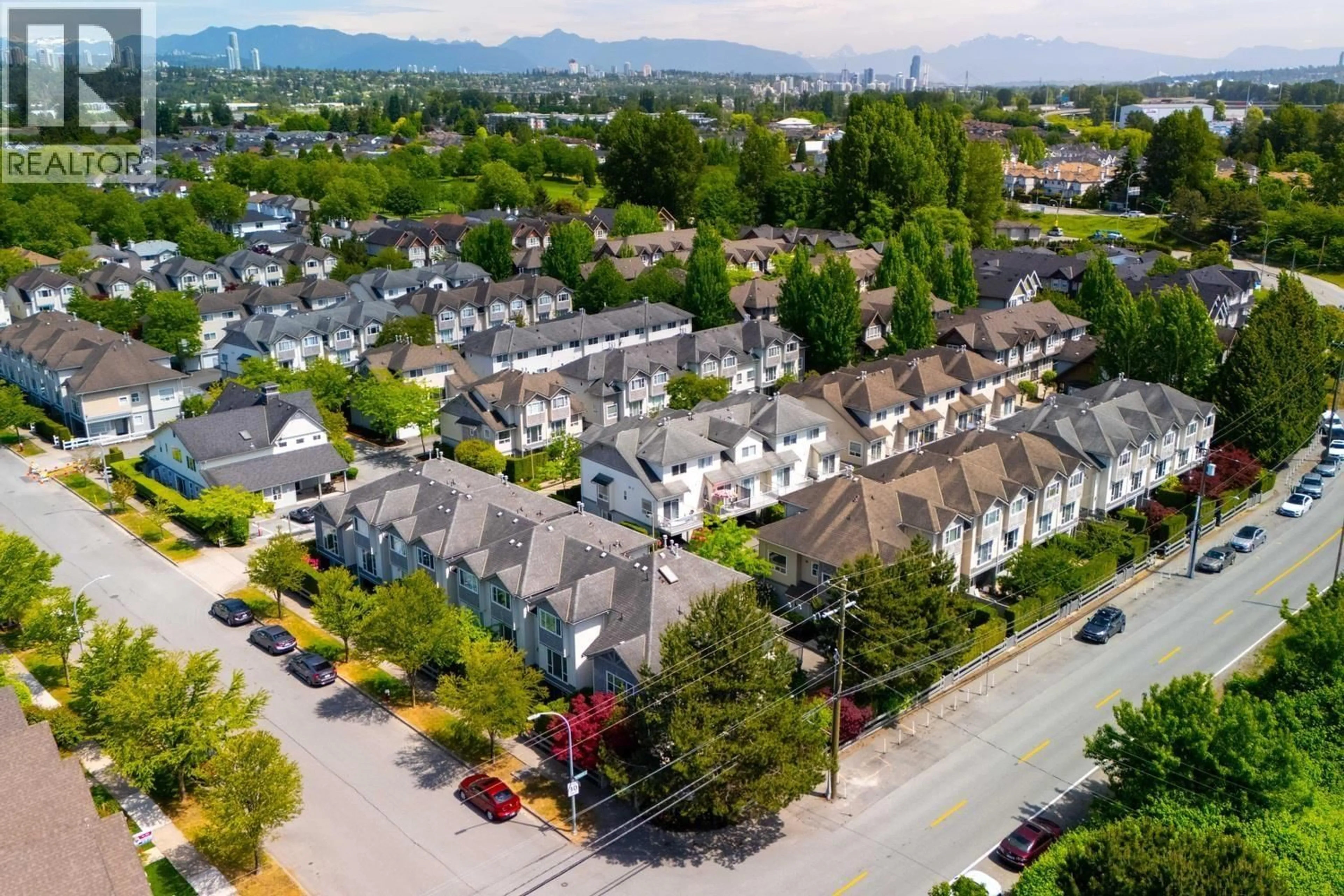 A pic from outside/outdoor area/front of a property/back of a property/a pic from drone, mountain view for 16 - 5900 MUIR DRIVE, Richmond British Columbia V6V2Y8