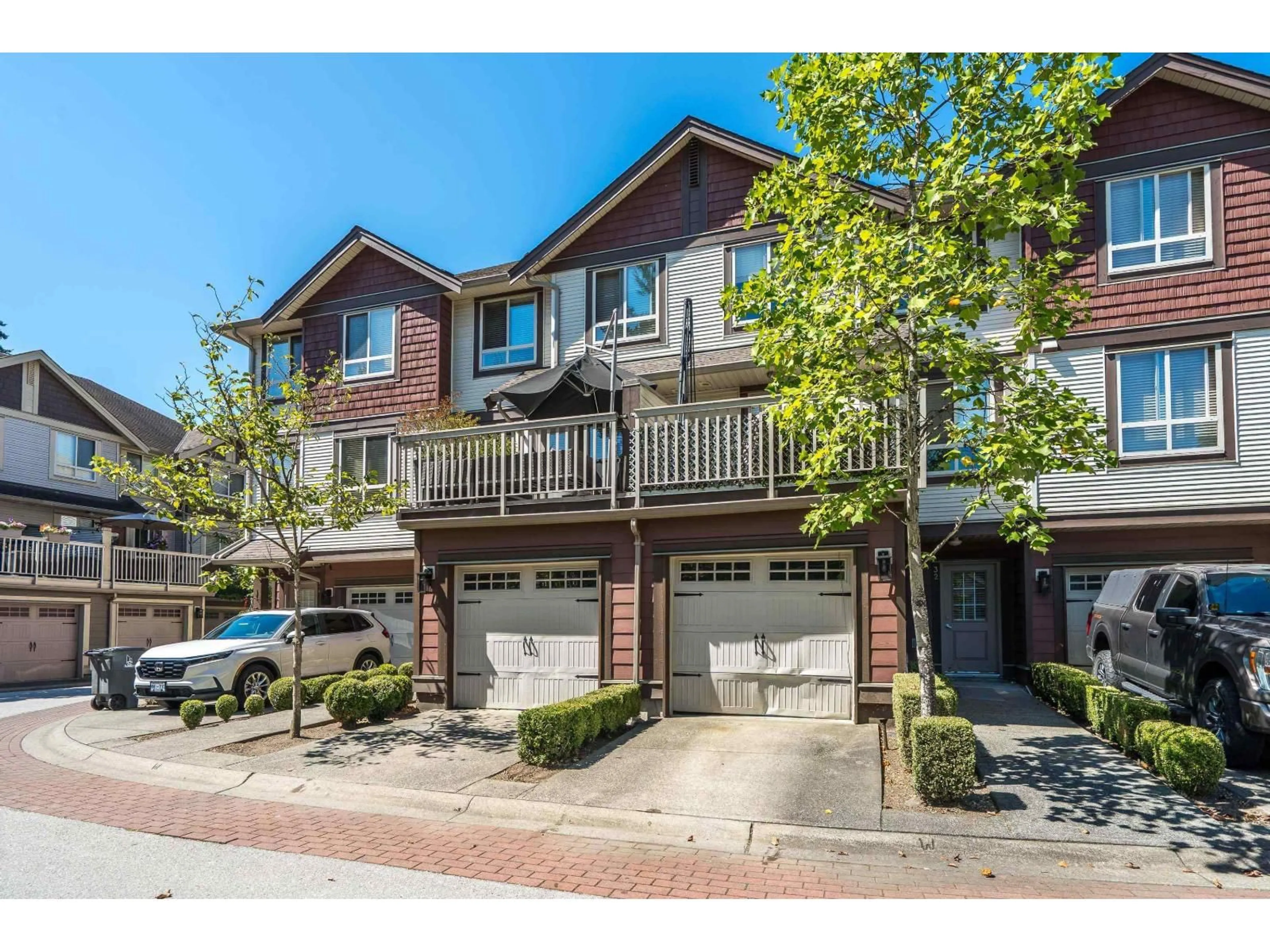 A pic from outside/outdoor area/front of a property/back of a property/a pic from drone, street for 32 - 19560 68 AVENUE, Surrey British Columbia V4N5Y5