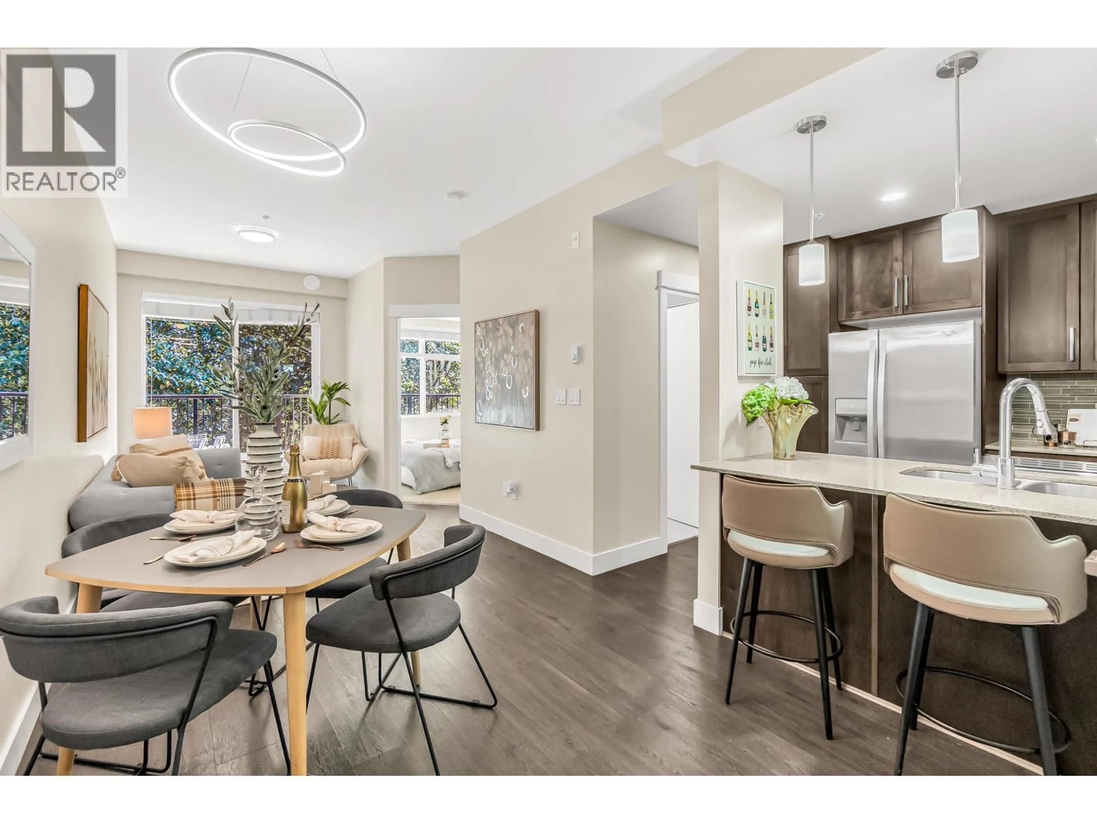 Open concept kitchen, wood/laminate floor for 509 - 2465 WILSON AVENUE, Port Coquitlam British Columbia V3C0E6