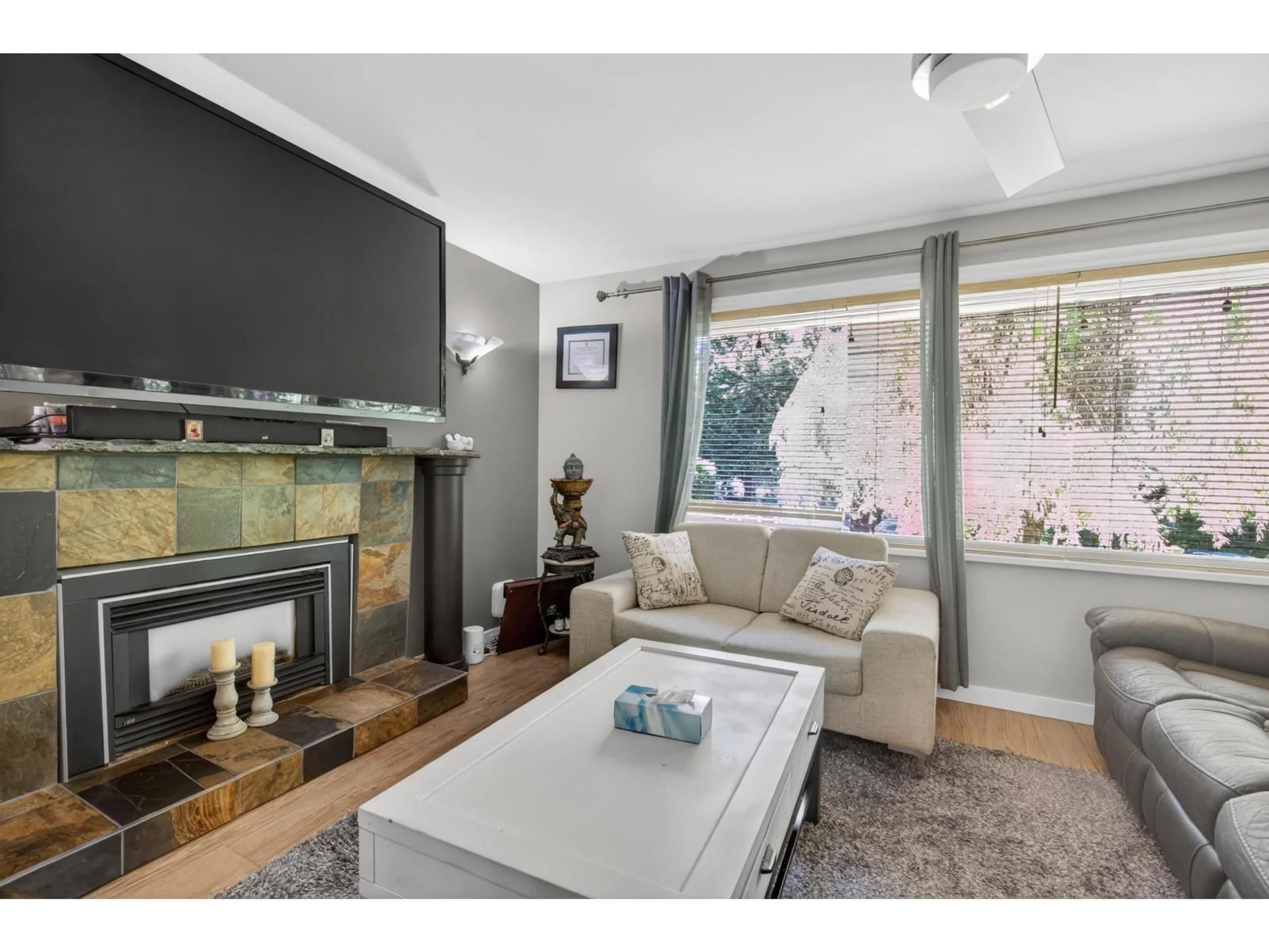 Living room with furniture, wood/laminate floor for 9140 NORUM ROAD, Delta British Columbia V4C3J1