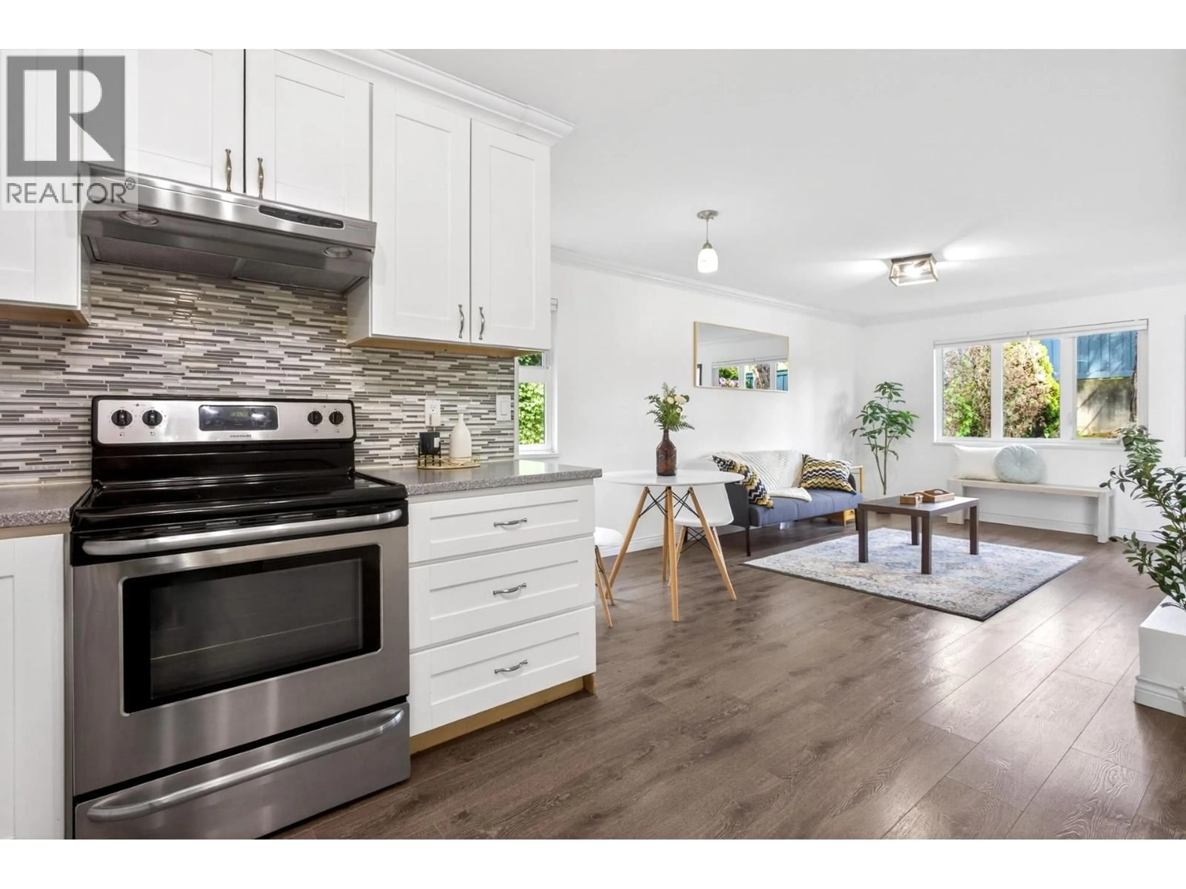 Open concept kitchen, wood/laminate floor for 105 - 1122 KING ALBERT AVENUE, Coquitlam British Columbia V3J1X7
