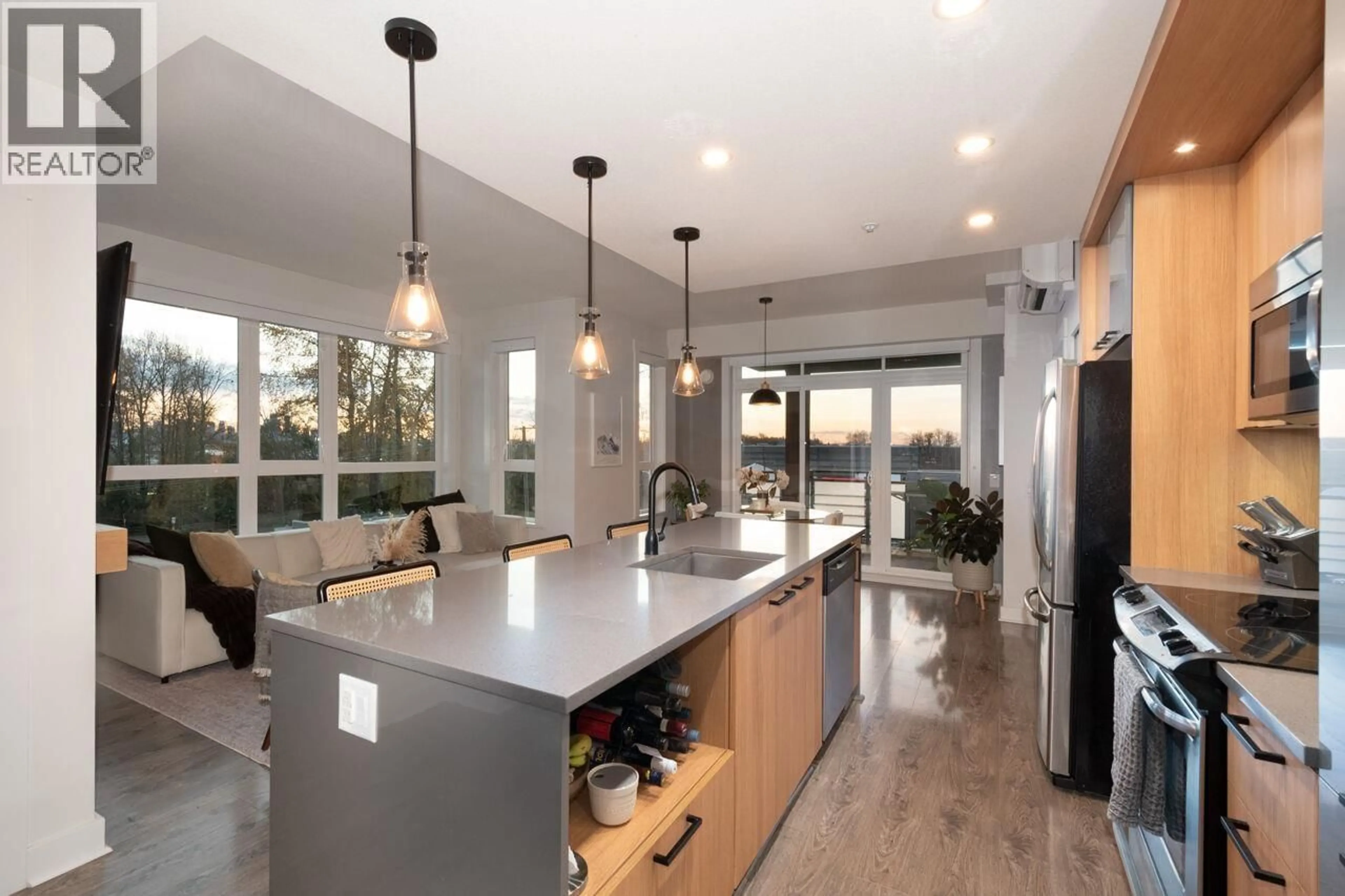 Open concept kitchen, ceramic/tile floor for 417 - 733 14TH STREET, North Vancouver British Columbia V7M0C6