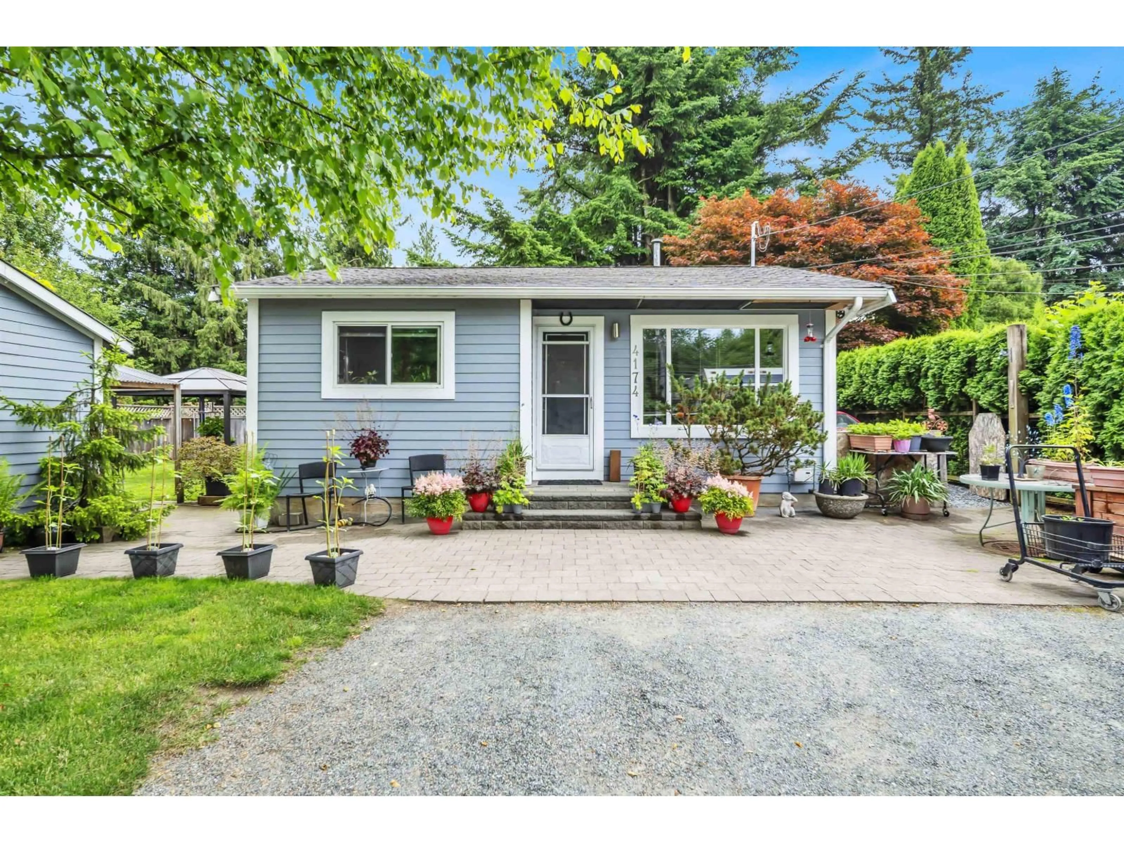 Home with vinyl exterior material, street for 4174 BRADNER ROAD, Abbotsford British Columbia V4X1S8