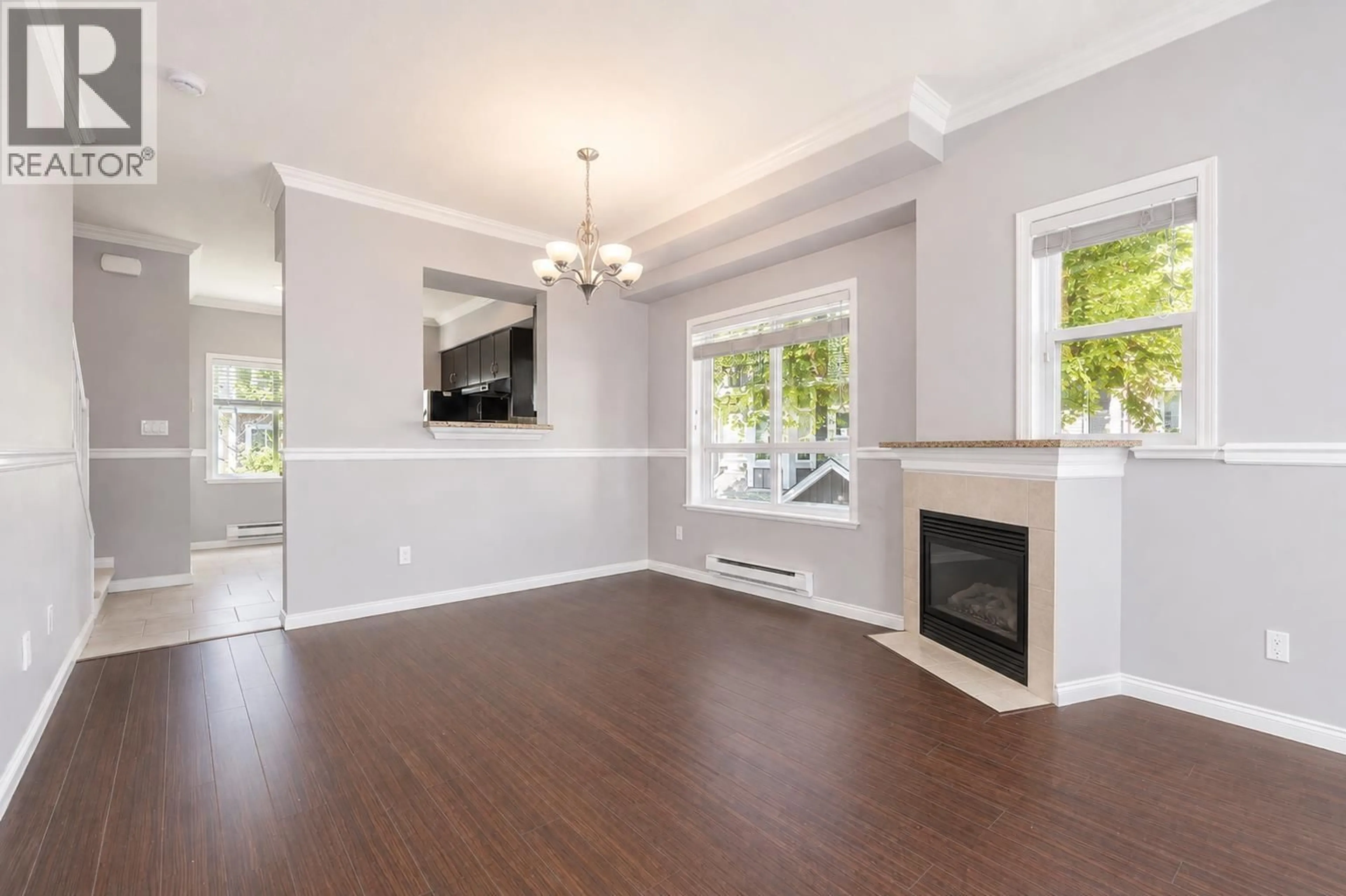 Living room with furniture, wood/laminate floor for 5 - 9451 GRANVILLE AVENUE, Richmond British Columbia V6Y1P9