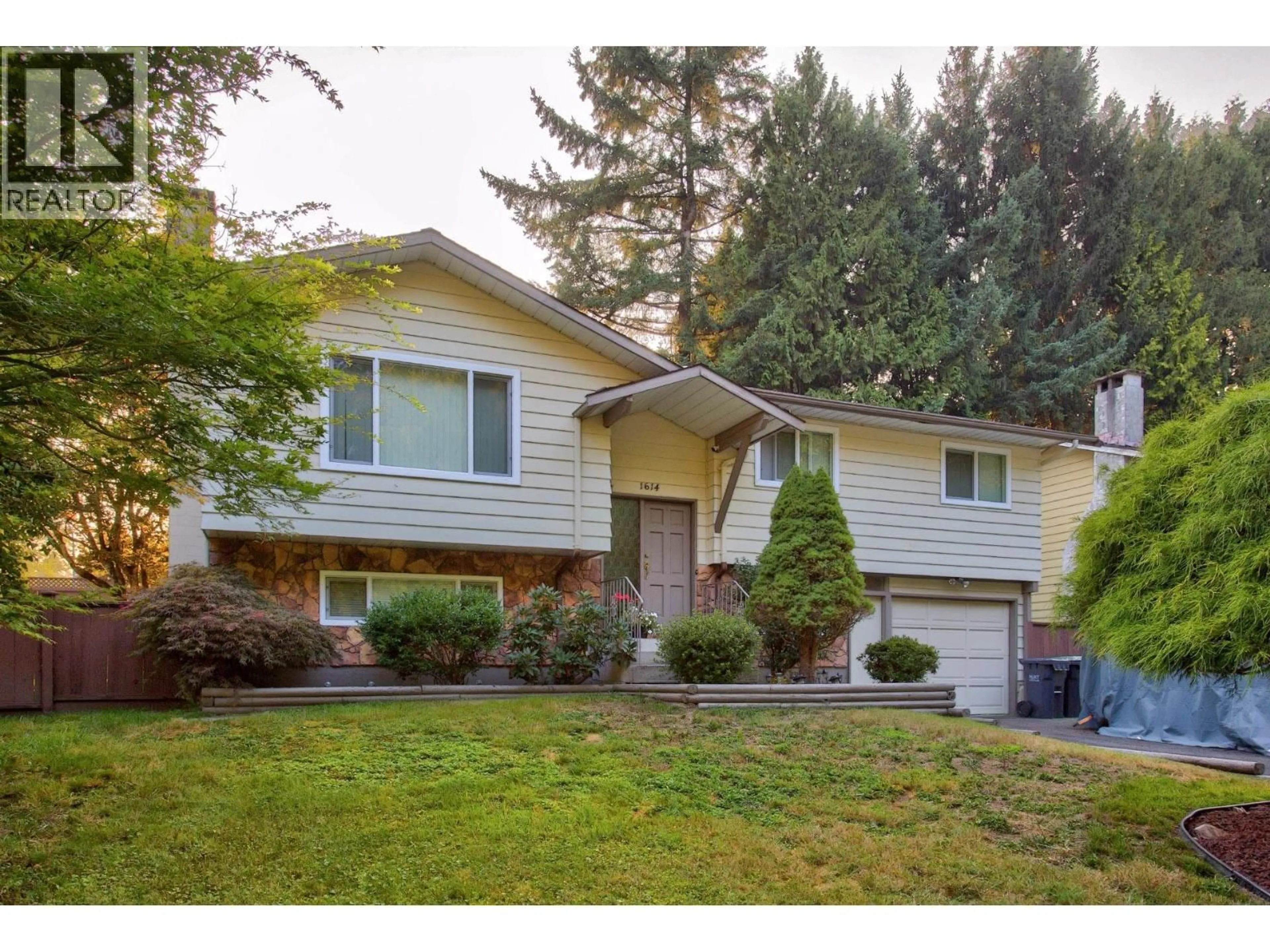 Home with vinyl exterior material, street for 1614 CONNAUGHT DRIVE, Port Coquitlam British Columbia V3C4G8