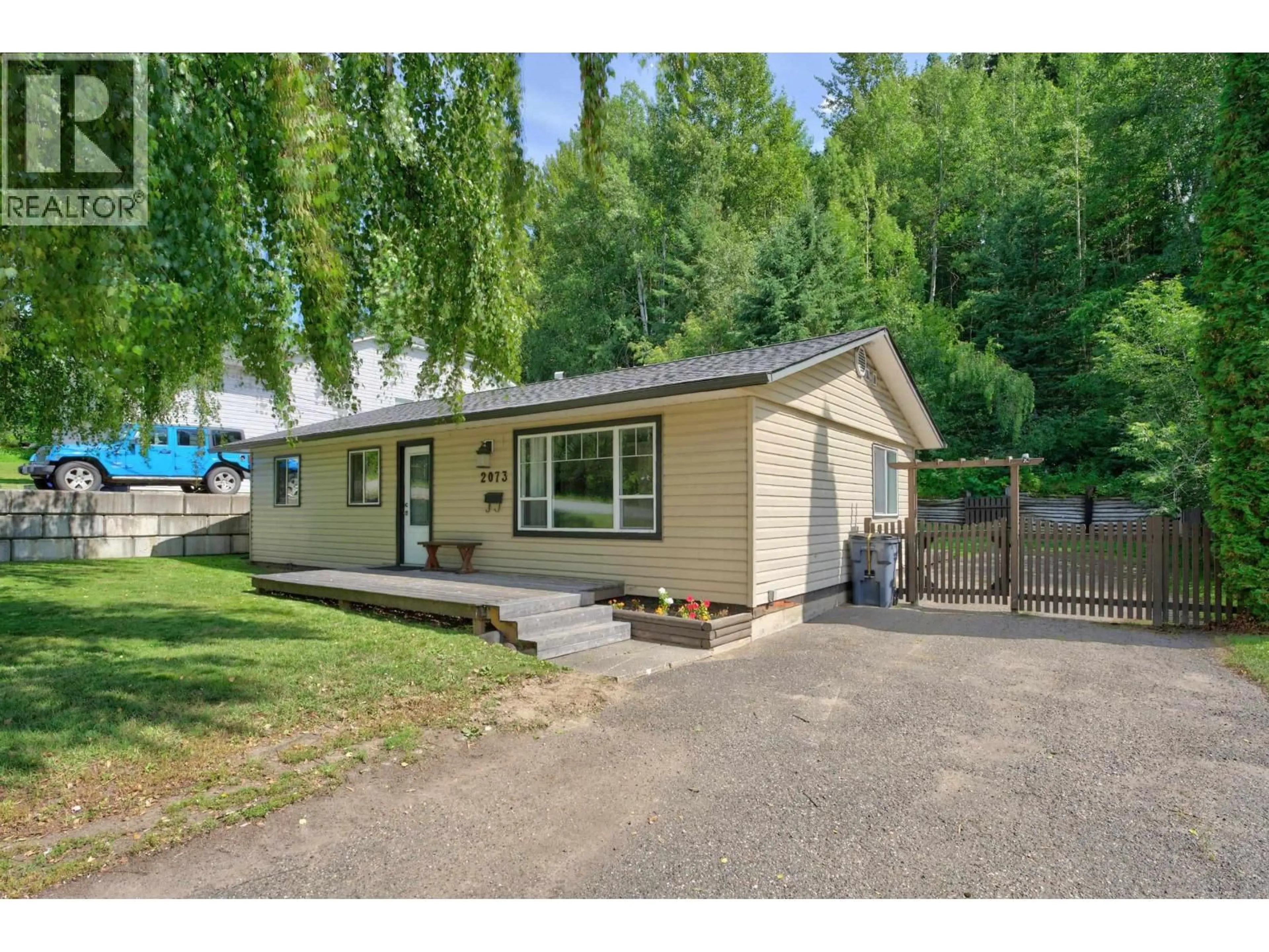 A pic from outside/outdoor area/front of a property/back of a property/a pic from drone, street for 2073 WOODHAVEN DRIVE, Prince George British Columbia V2K3C4