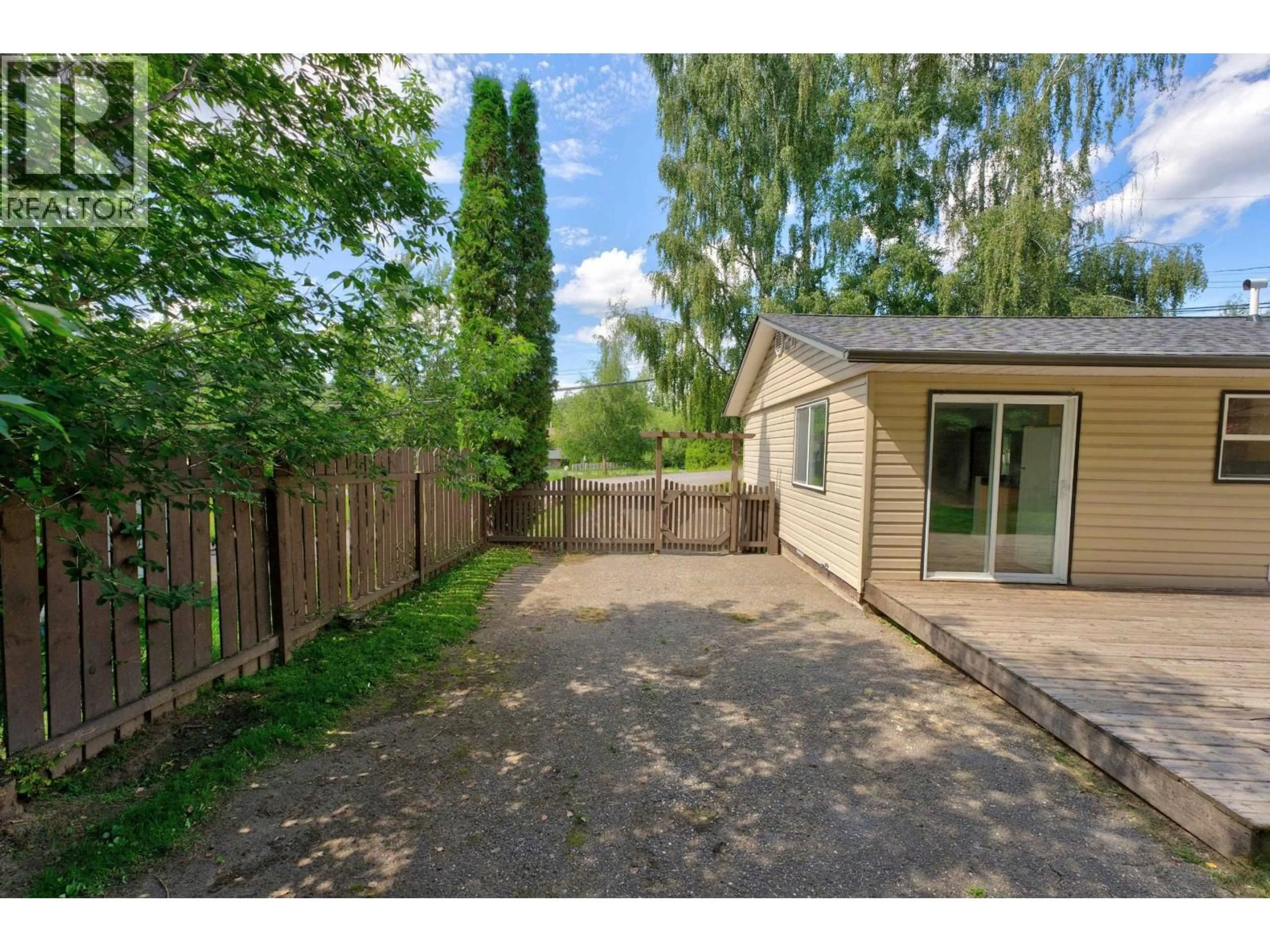A pic from outside/outdoor area/front of a property/back of a property/a pic from drone, street for 2073 WOODHAVEN DRIVE, Prince George British Columbia V2K3C4