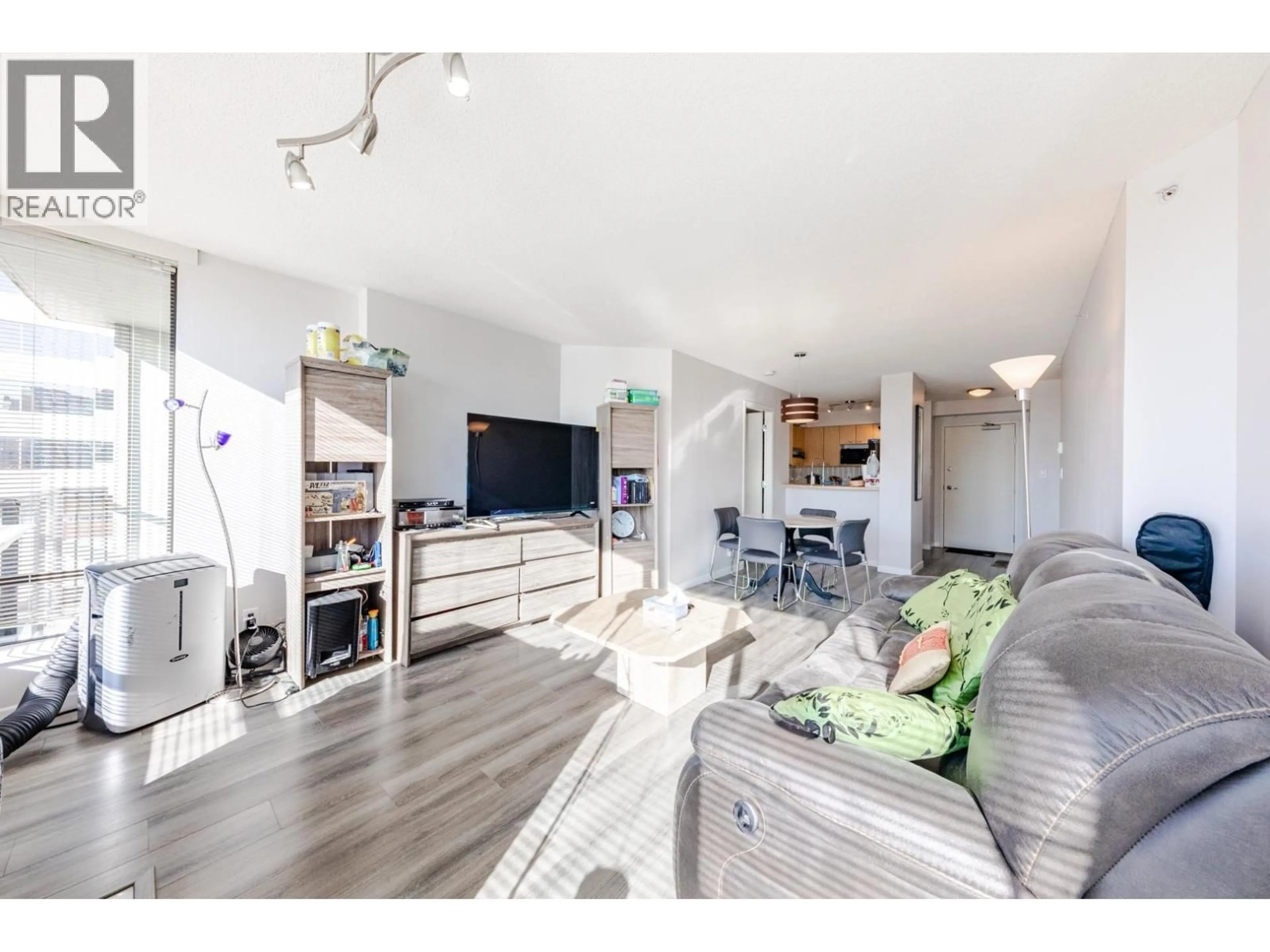 Living room with furniture, wood/laminate floor for 708 - 8180 GRANVILLE AVENUE, Richmond British Columbia V6Y4G1