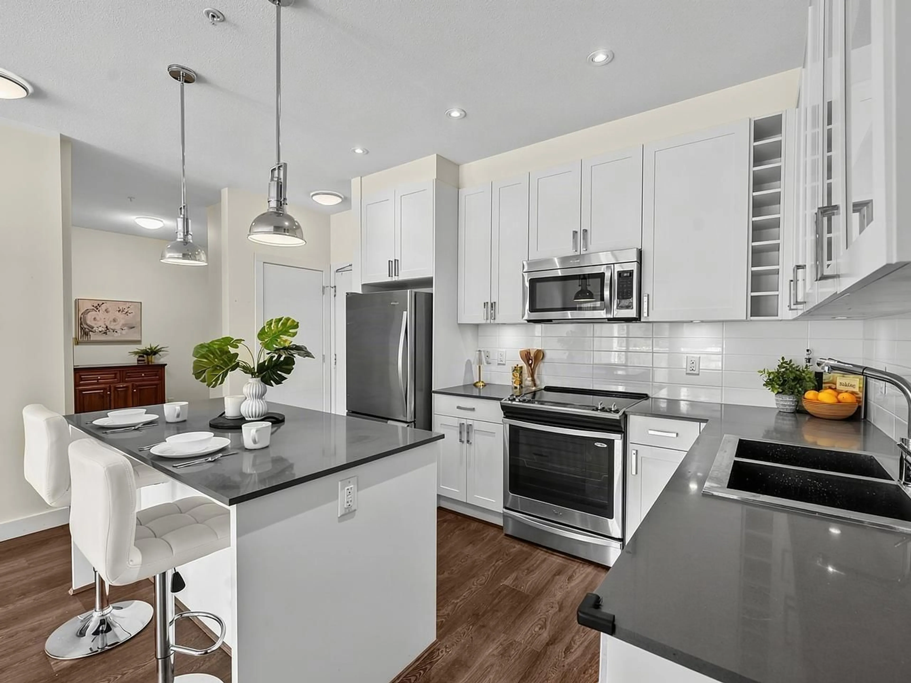 Open concept kitchen, unknown for 202 - 16398 64 AVENUE, Surrey British Columbia V3S6X6