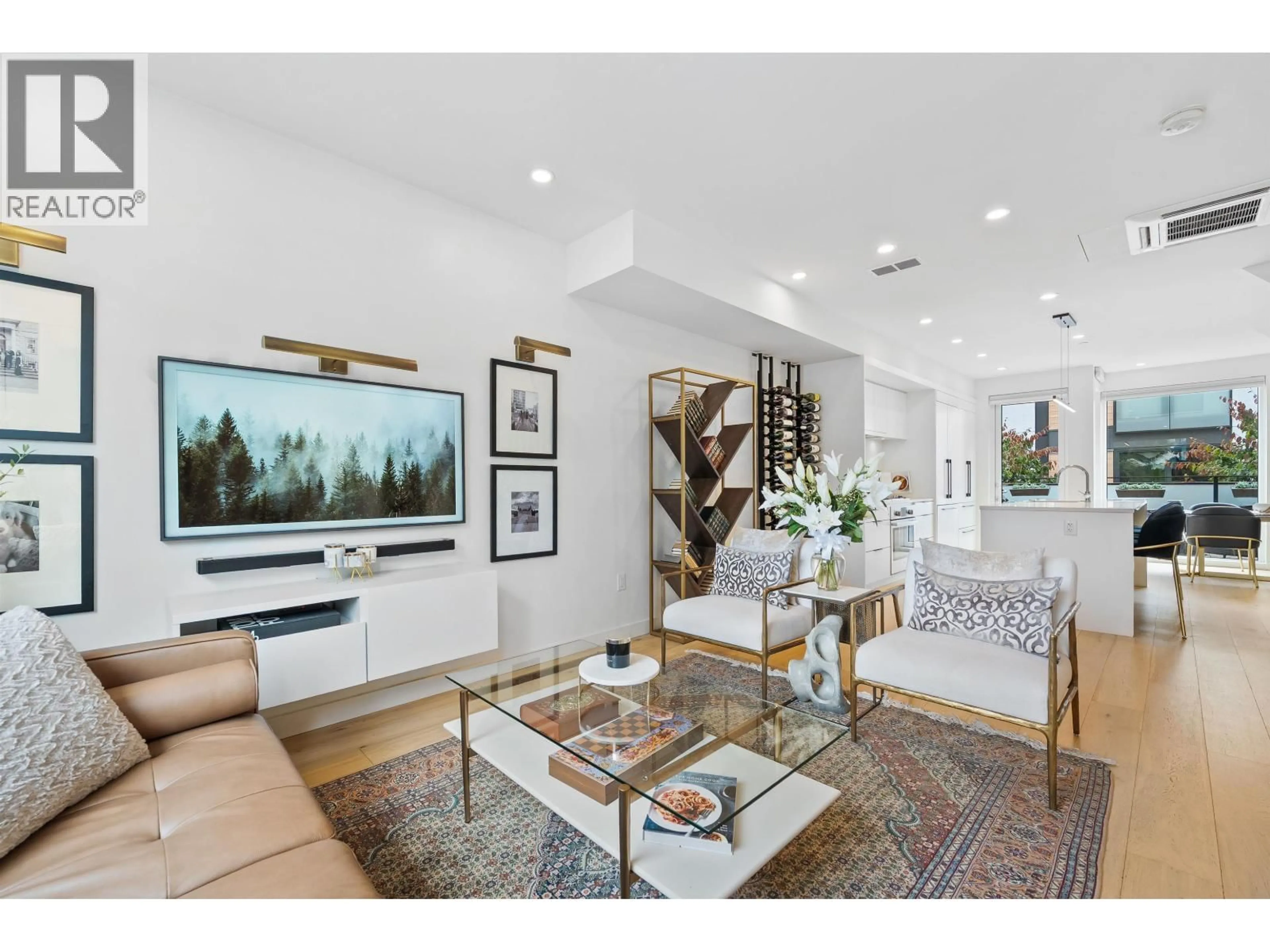 Living room with furniture, unknown for 207 - 649 3 STREET, North Vancouver British Columbia V7L1G6