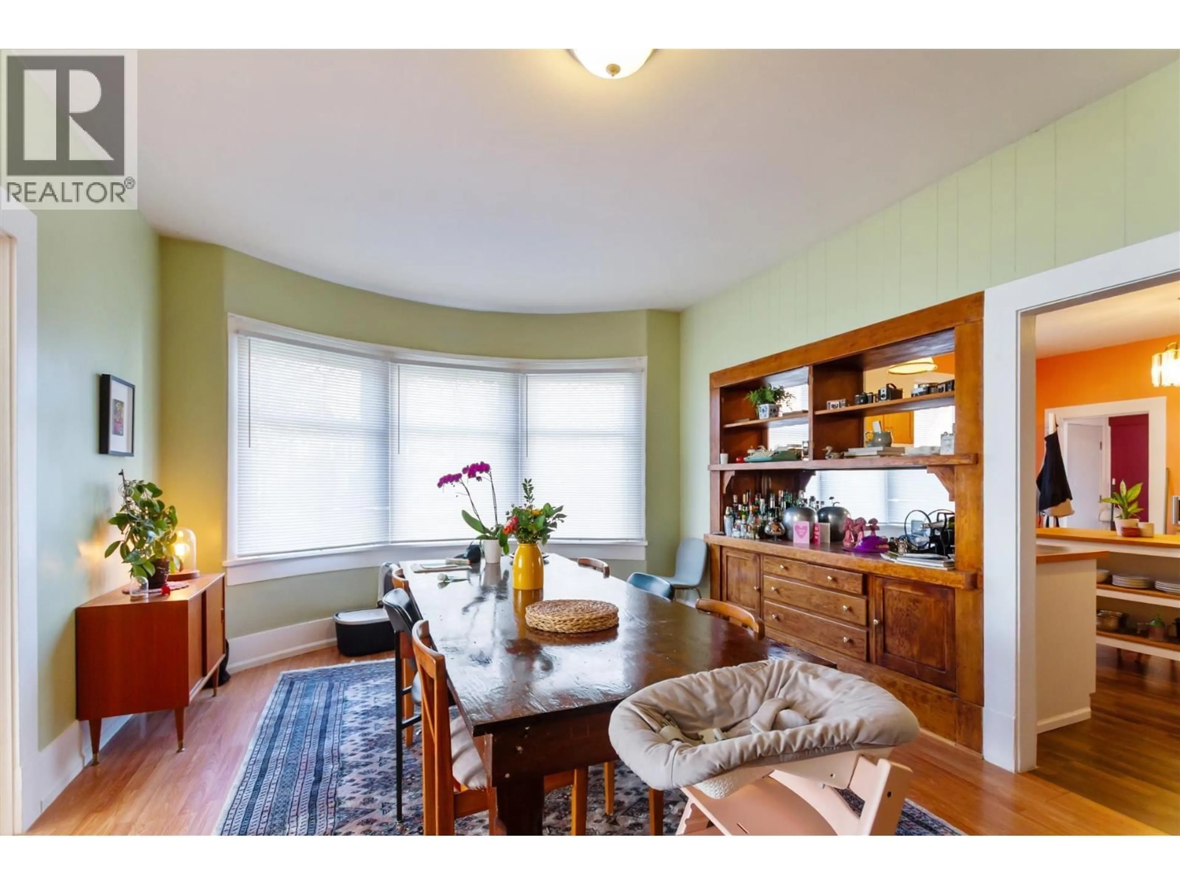 Dining room, wood/laminate floor for 1925 ADANAC STREET, Vancouver British Columbia V5L2E5