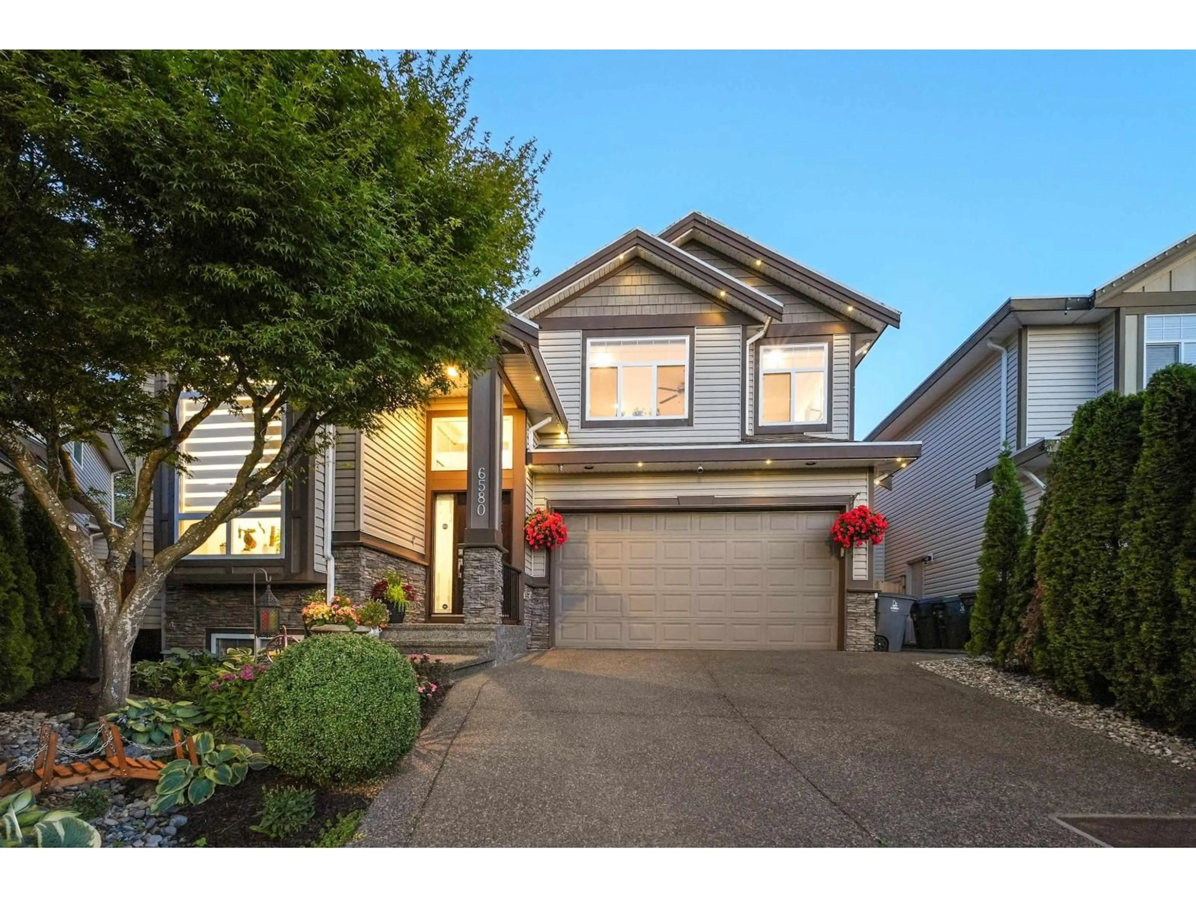 Home with vinyl exterior material, street for 6580 187 STREET, Surrey British Columbia V3S4E5