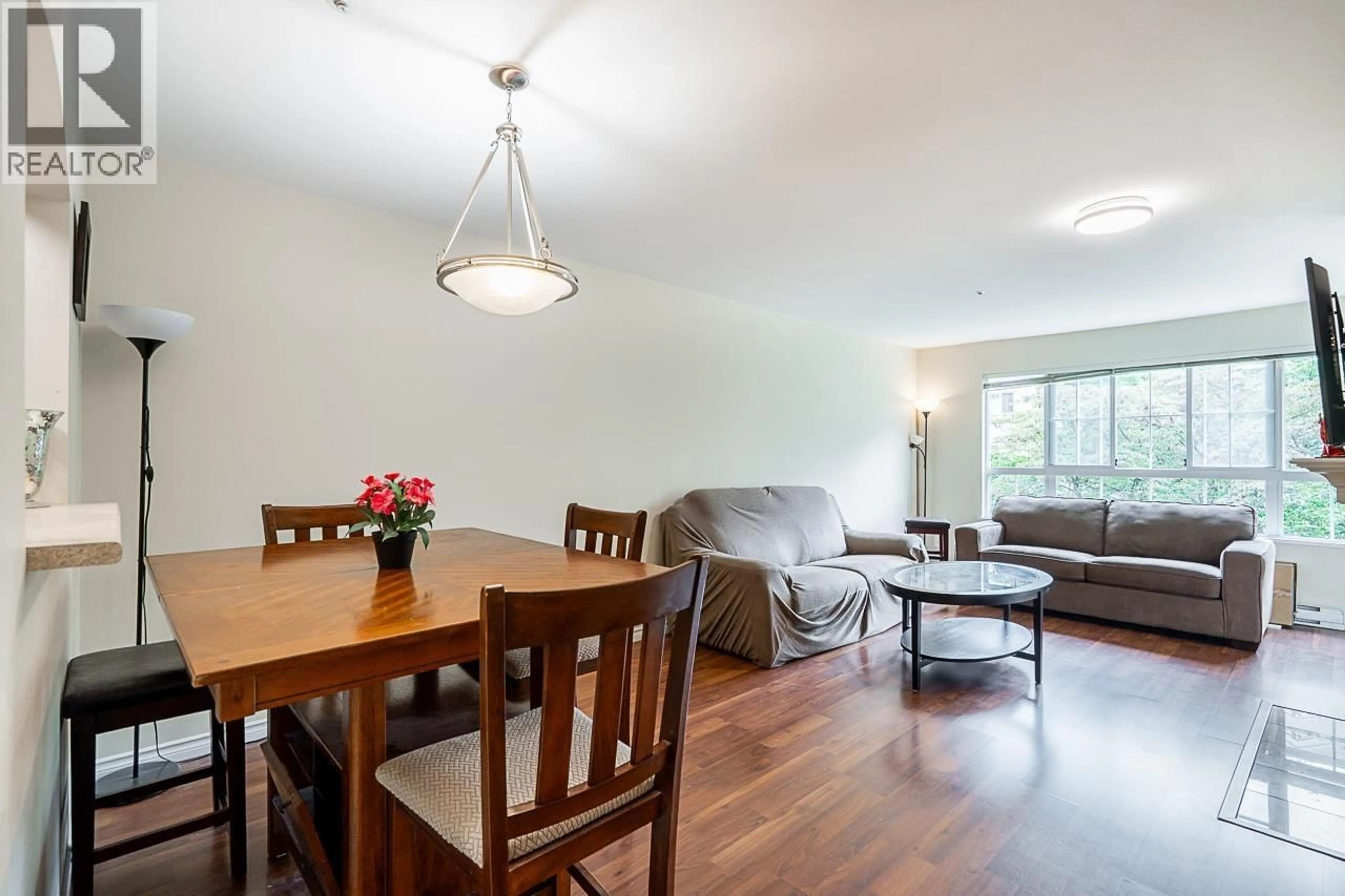 Living room with furniture, wood/laminate floor for 227 - 2980 PRINCESS CRESCENT, Coquitlam British Columbia V3B7R4