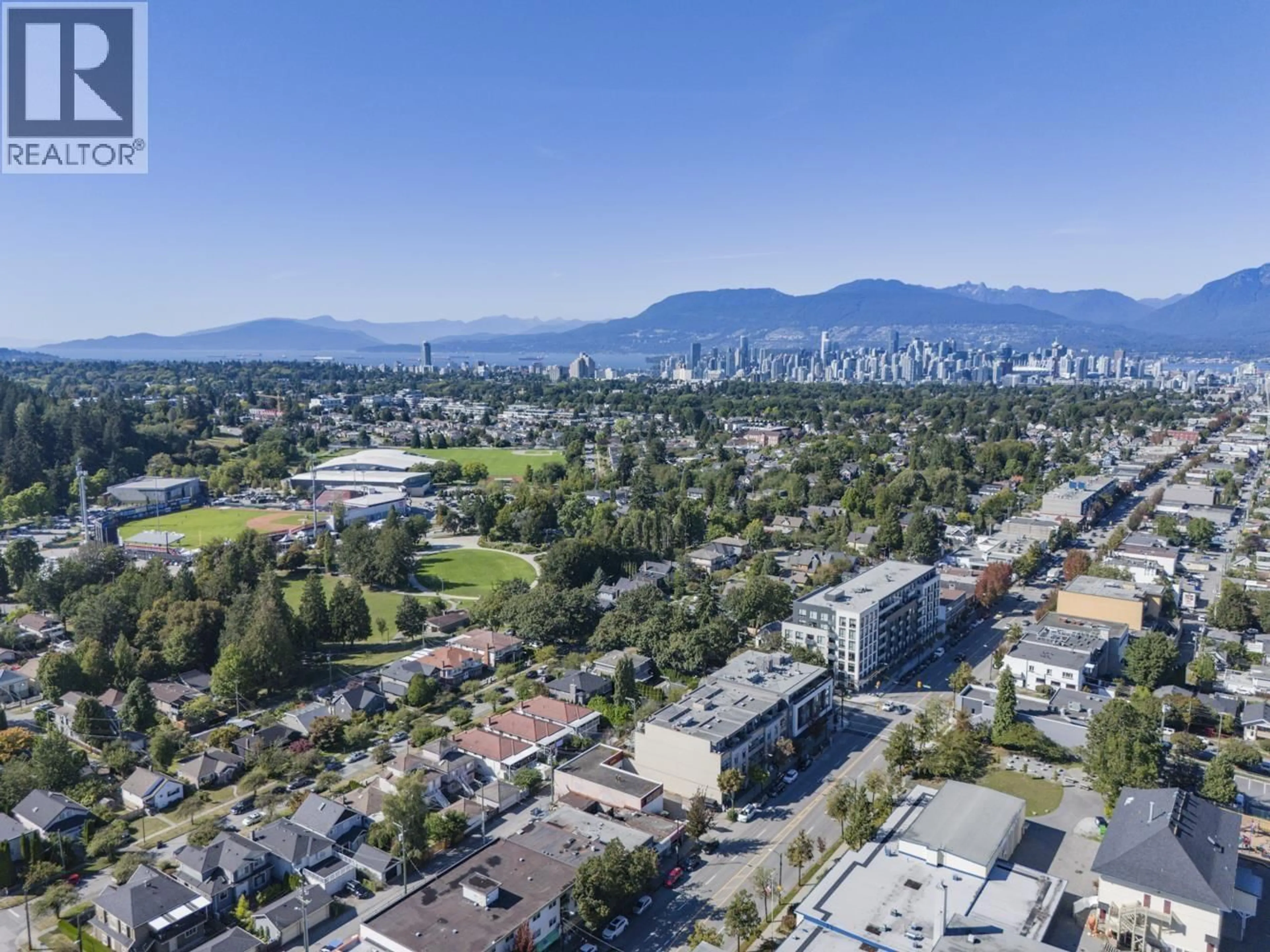 A pic from outside/outdoor area/front of a property/back of a property/a pic from drone, mountain view for 301 - 188 32ND AVENUE, Vancouver British Columbia V5V0E4