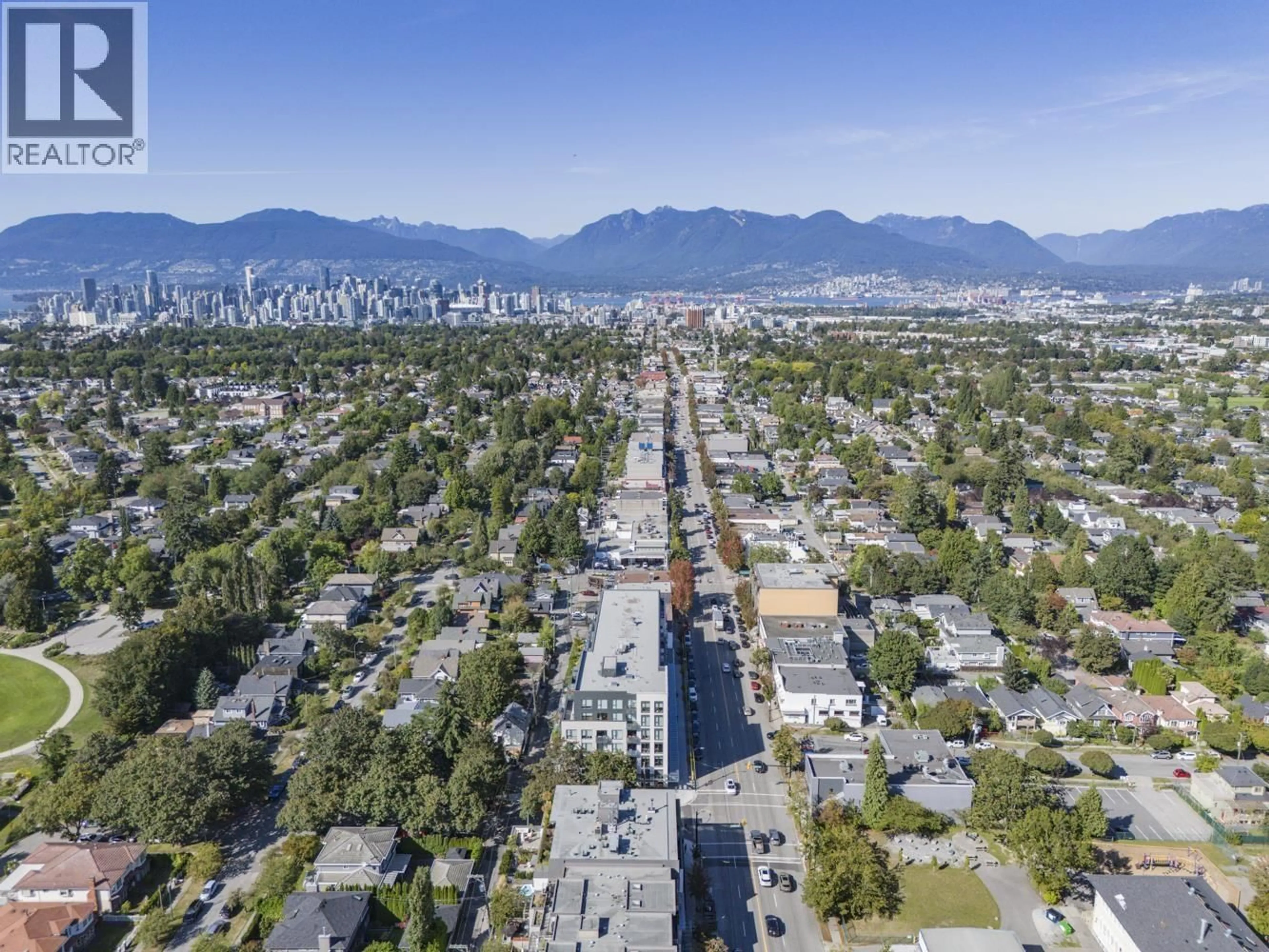 A pic from outside/outdoor area/front of a property/back of a property/a pic from drone, unknown for 301 - 188 32ND AVENUE, Vancouver British Columbia V5V0E4