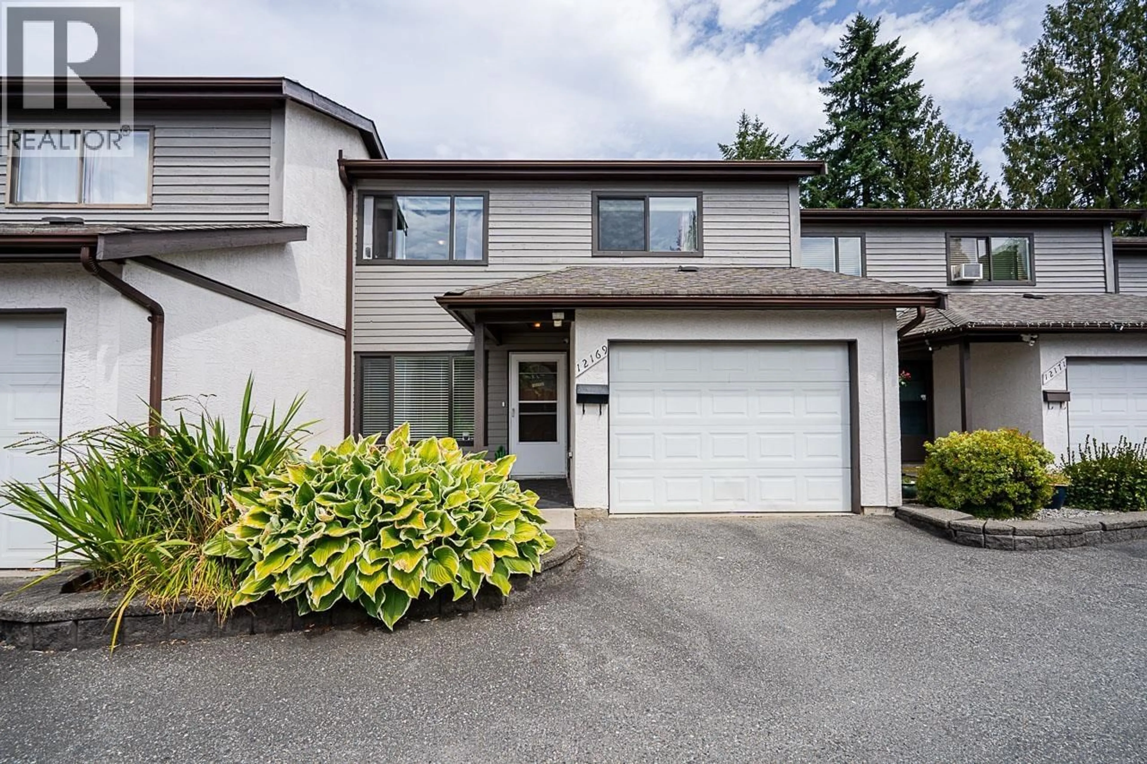 Home with vinyl exterior material, street for 12169 222 STREET, Maple Ridge British Columbia V2X5W4