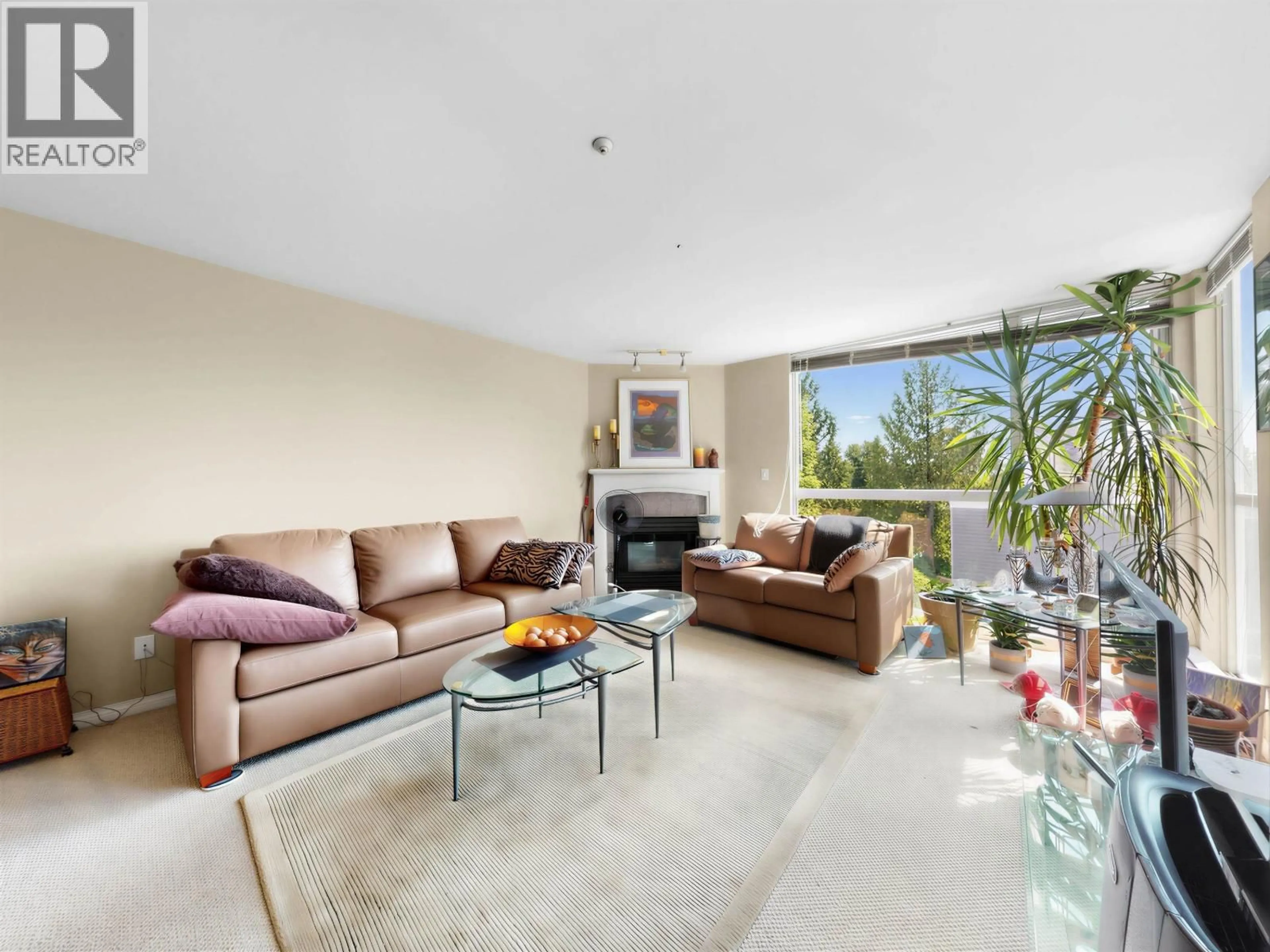 Living room with furniture, unknown for 312 - 8450 JELLICOE STREET, Vancouver British Columbia V5S4S9