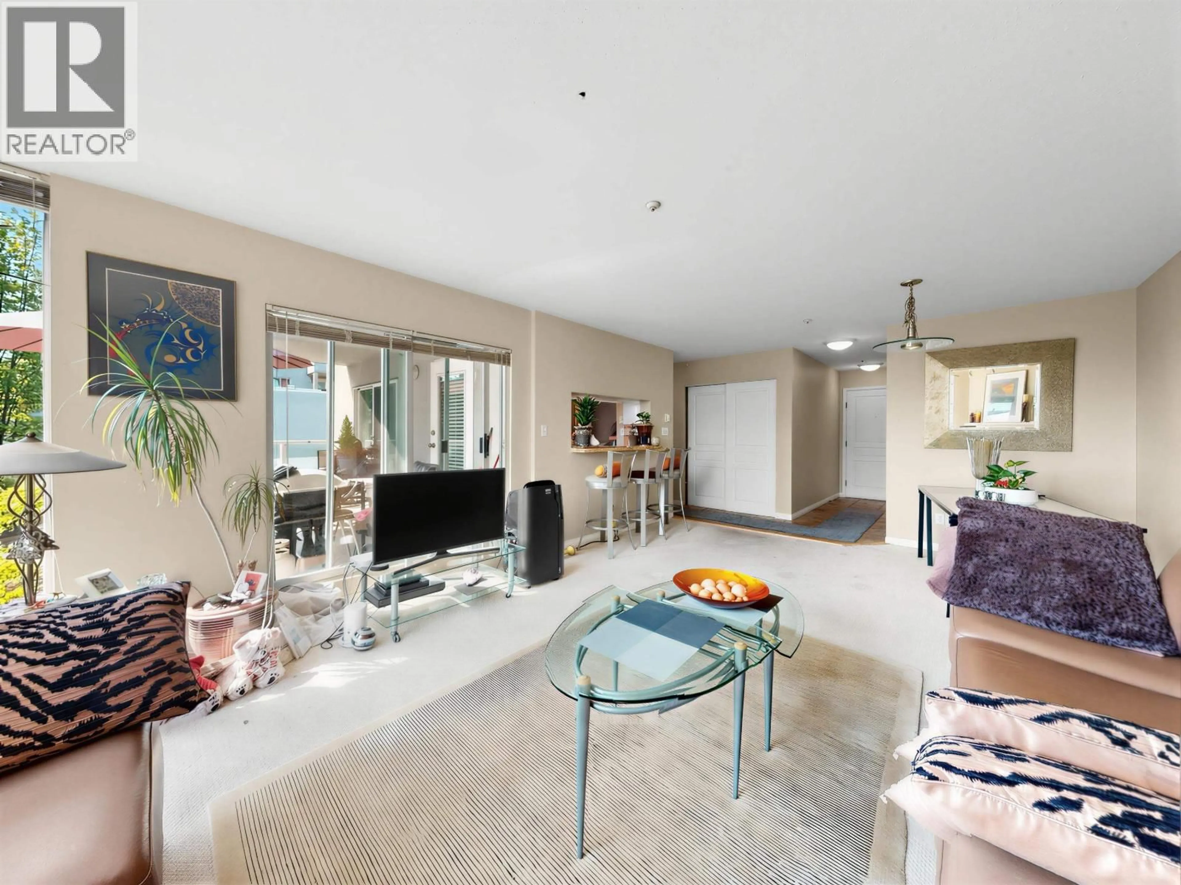 Living room with furniture, unknown for 312 - 8450 JELLICOE STREET, Vancouver British Columbia V5S4S9