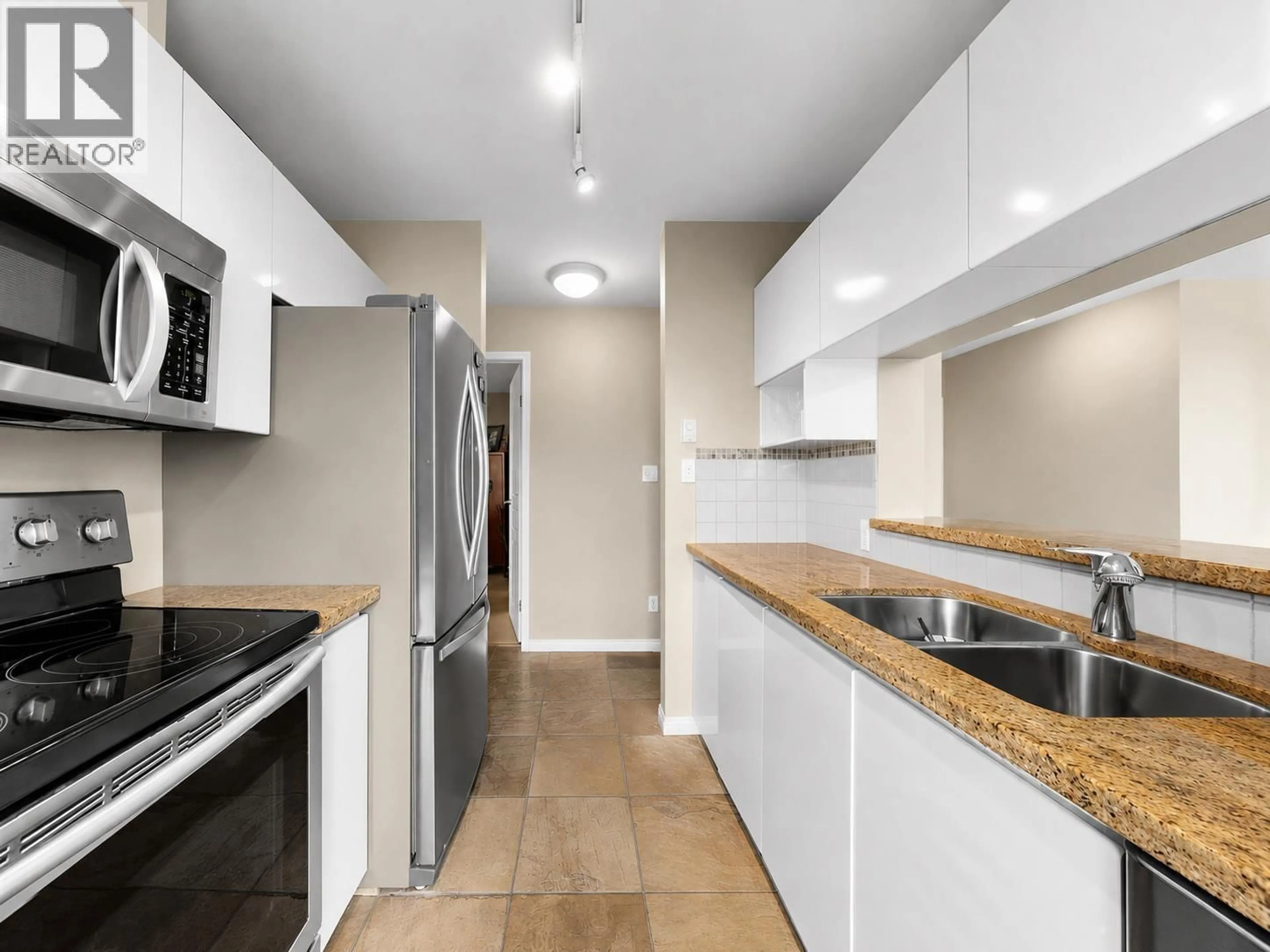 Standard kitchen, unknown for 312 - 8450 JELLICOE STREET, Vancouver British Columbia V5S4S9