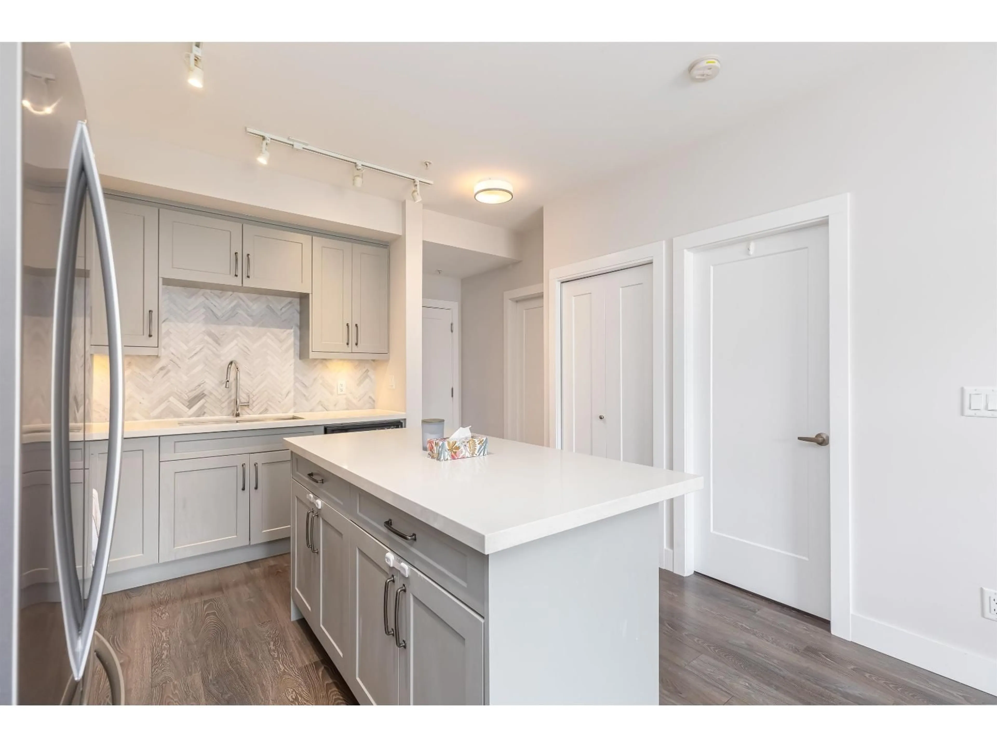 Open concept kitchen, unknown for 303 - 14605 MCDOUGALL DRIVE, Surrey British Columbia V4P0G7
