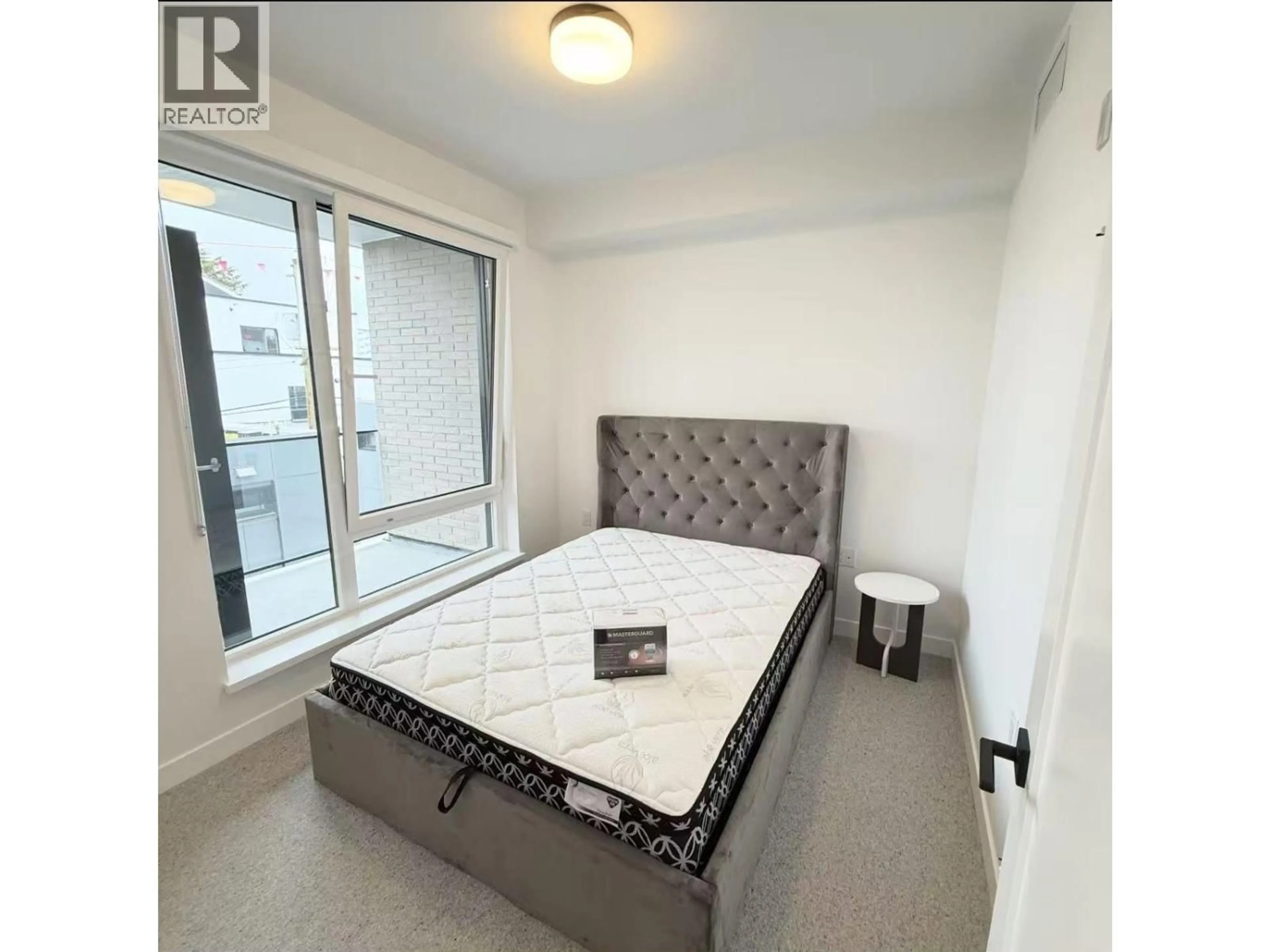 Bedroom with bed, unknown for 313 - 6859 CAMBIE STREET, Vancouver British Columbia V6P3H1