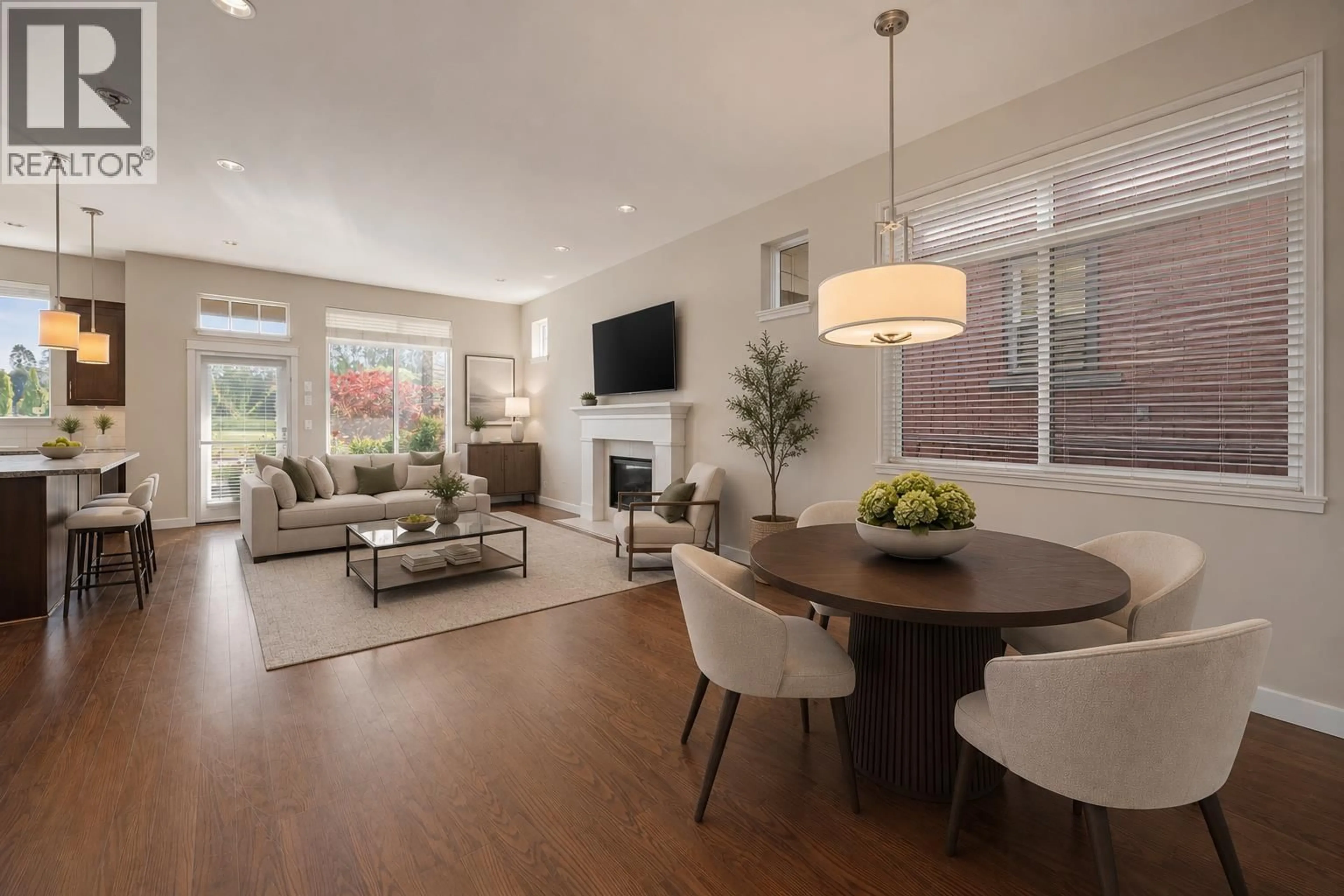 Living room with furniture, wood/laminate floor for 5116 CEDAR SPRINGS DRIVE, Delta British Columbia V4M0A7
