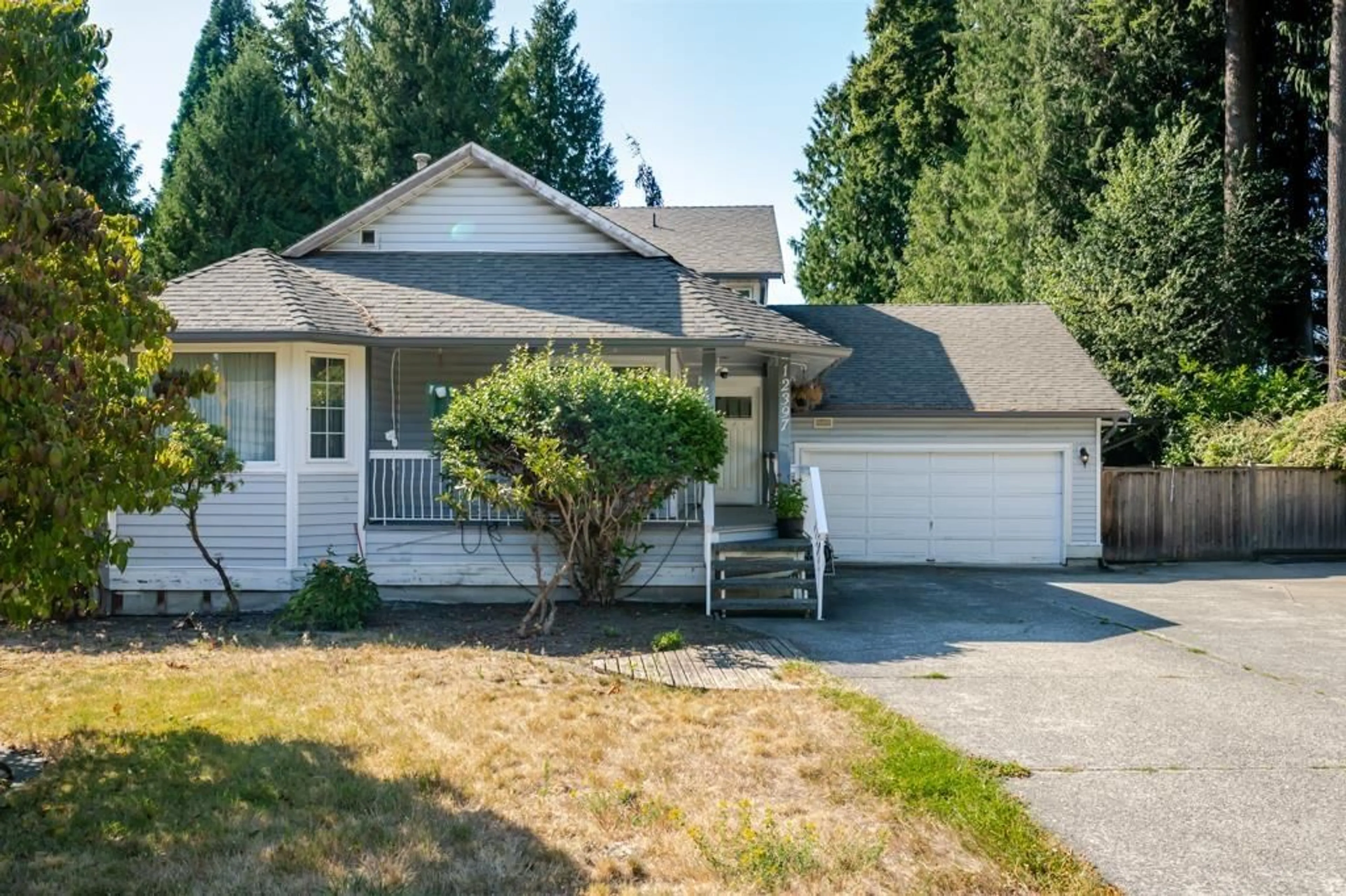 Home with vinyl exterior material, street for 12397 BOUNDARY DRIVE SOUTH, Surrey British Columbia V3X2C6