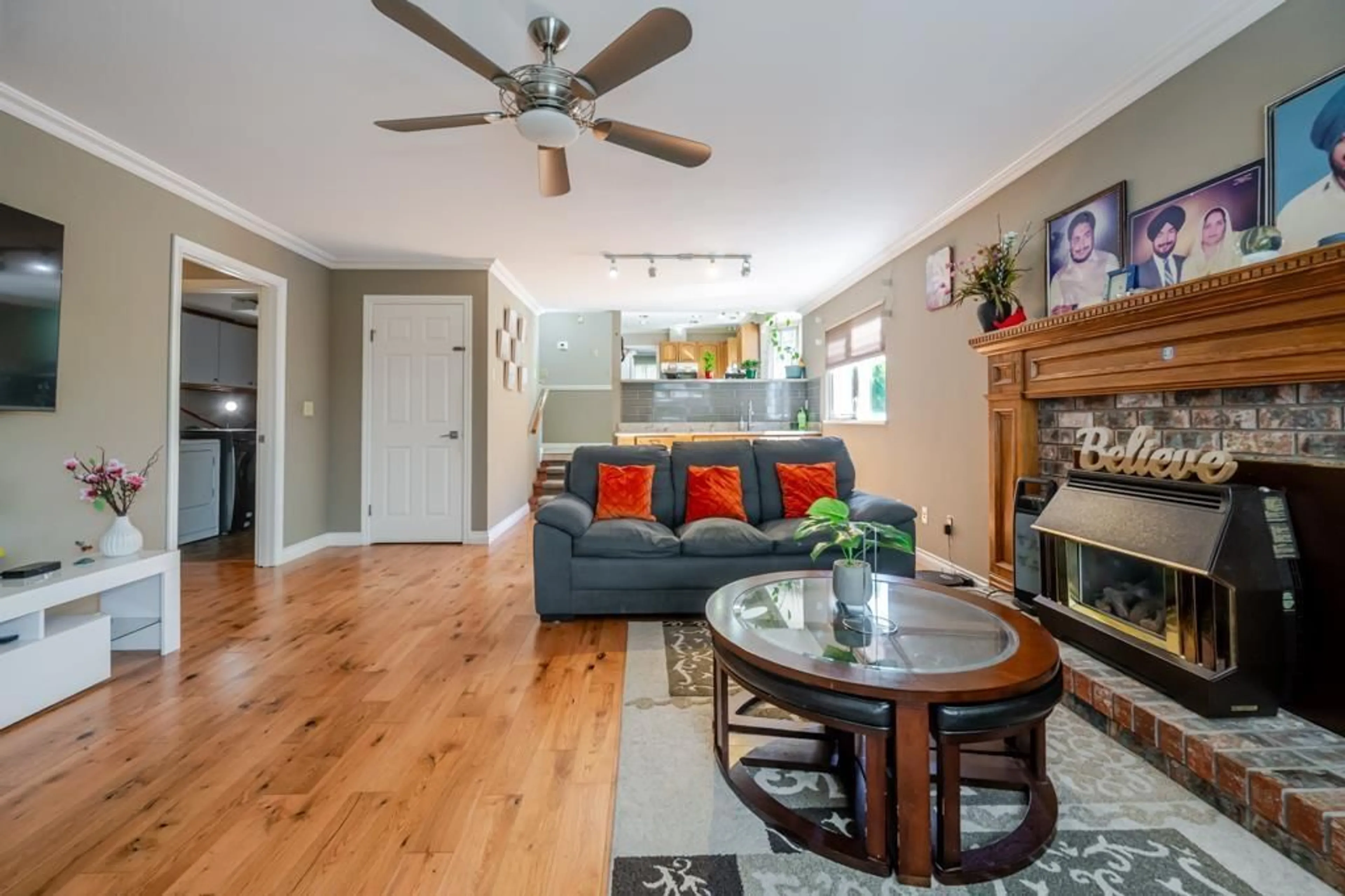 Living room with furniture, wood/laminate floor for 12397 BOUNDARY DRIVE SOUTH, Surrey British Columbia V3X2C6