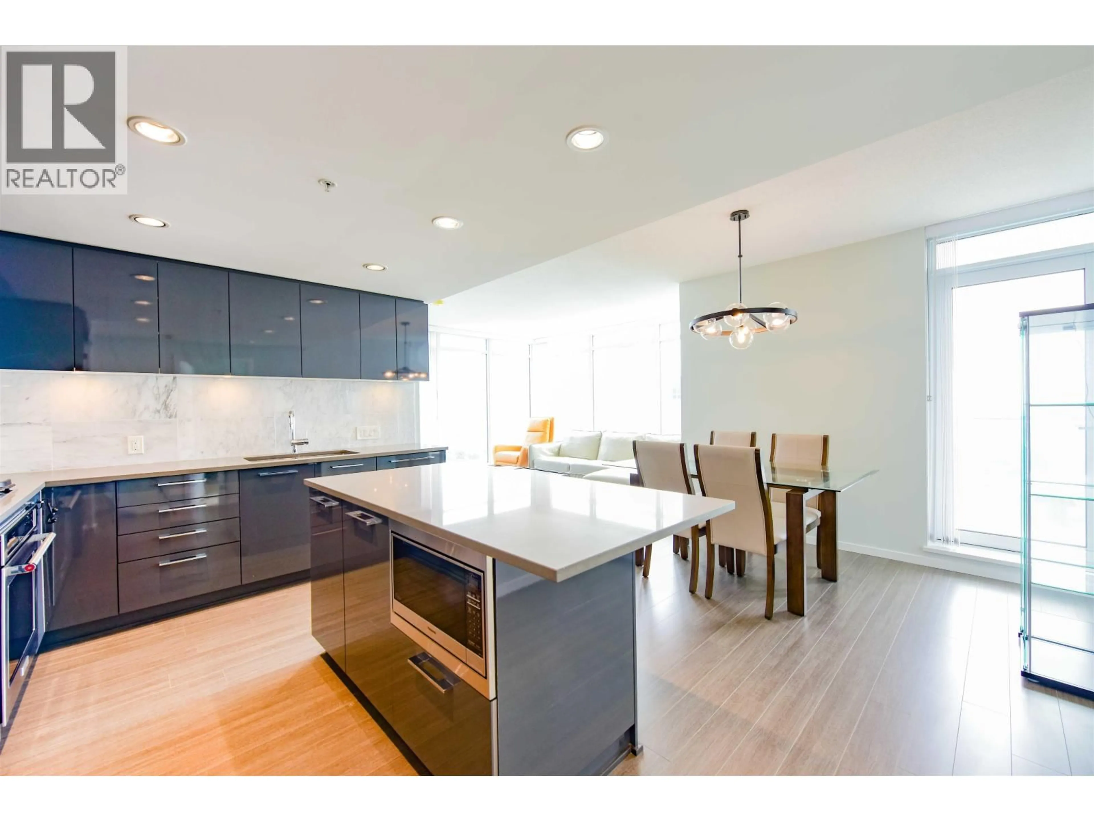 Open concept kitchen, wood/laminate floor for 2808 - 6700 DUNBLANE AVENUE, Burnaby British Columbia V5H0J3